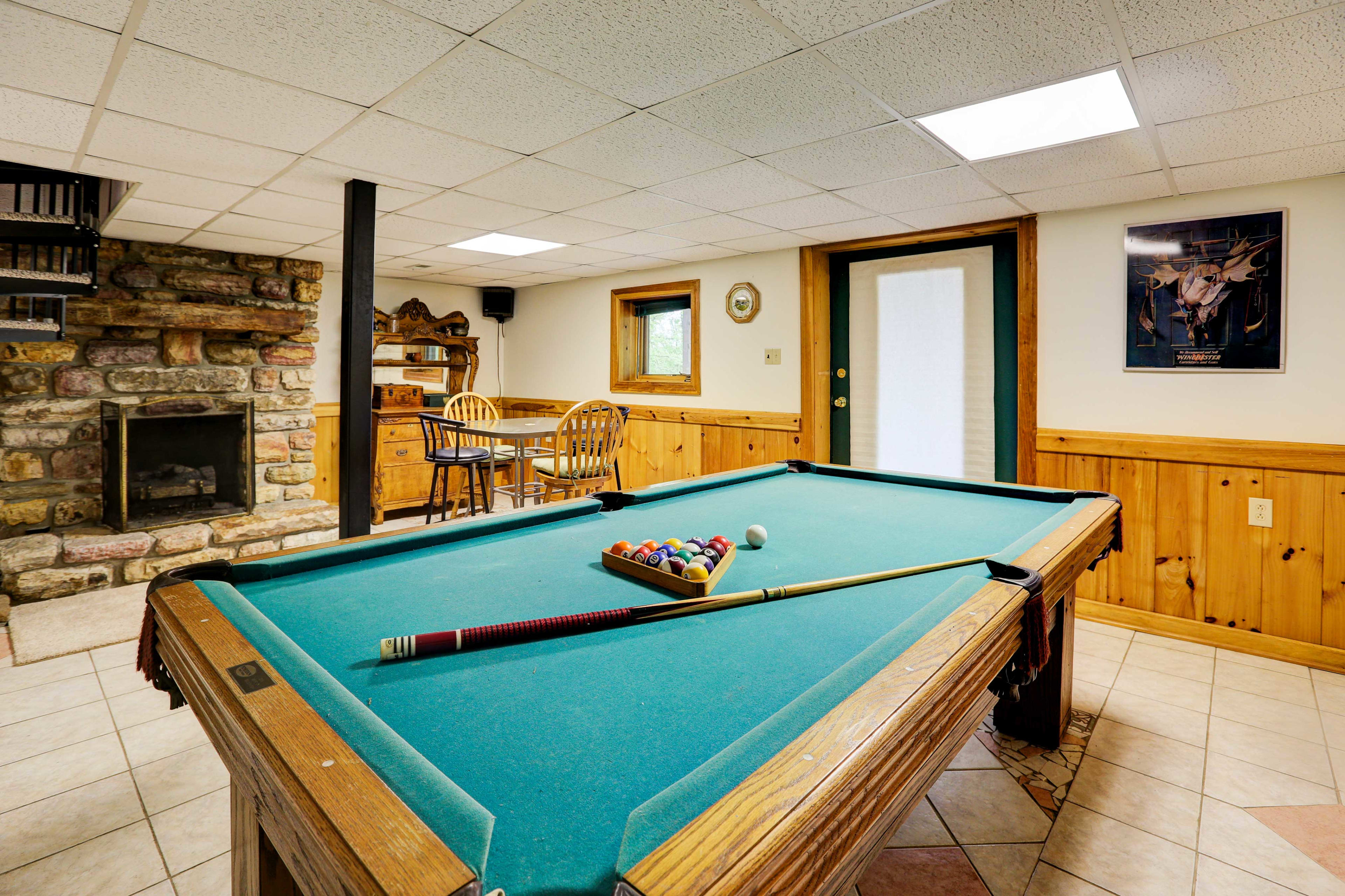 You'll find a pool table for your group to enjoy along with additional seating.