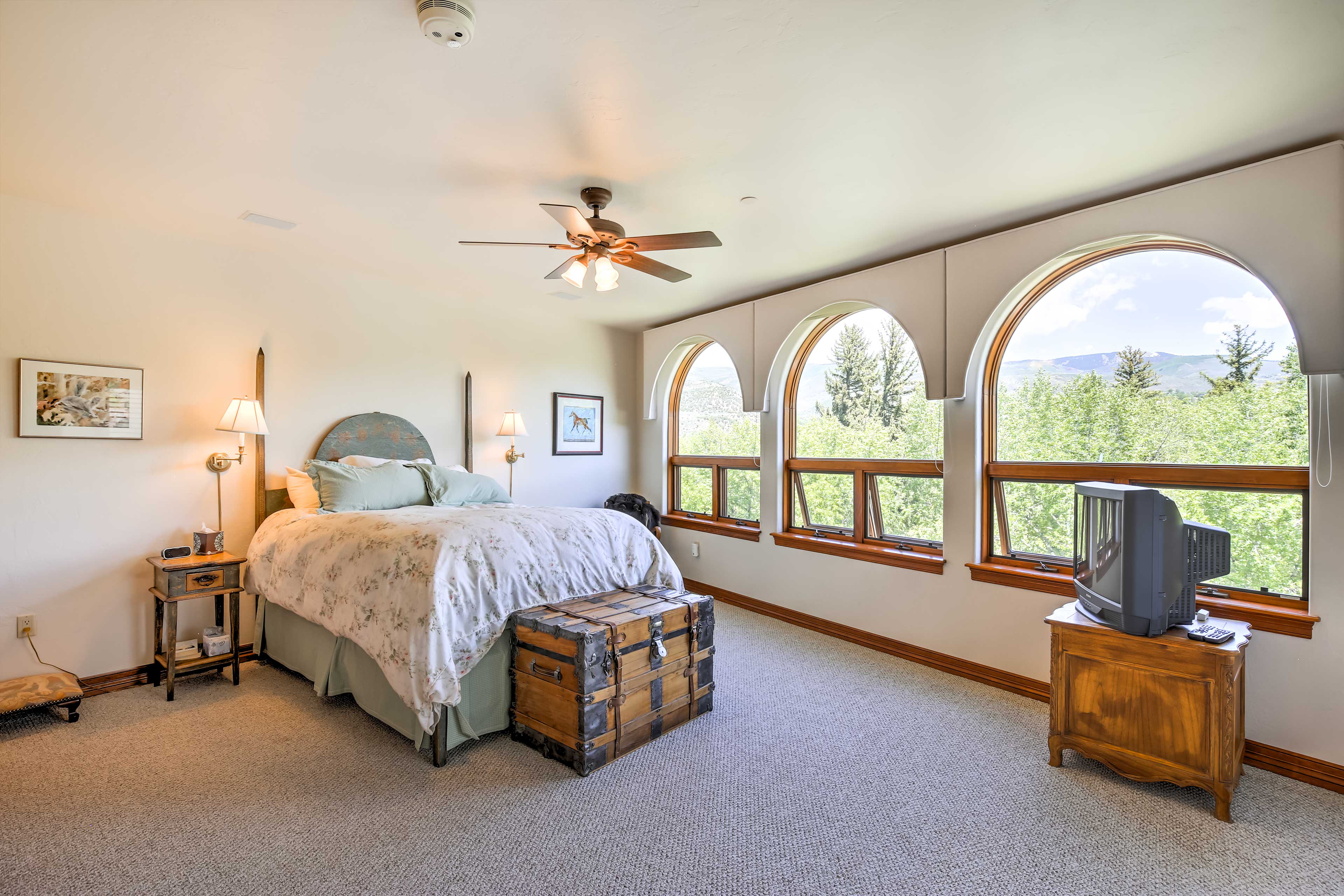 The second bedroom has a queen-sized bed and great views from its large windows!