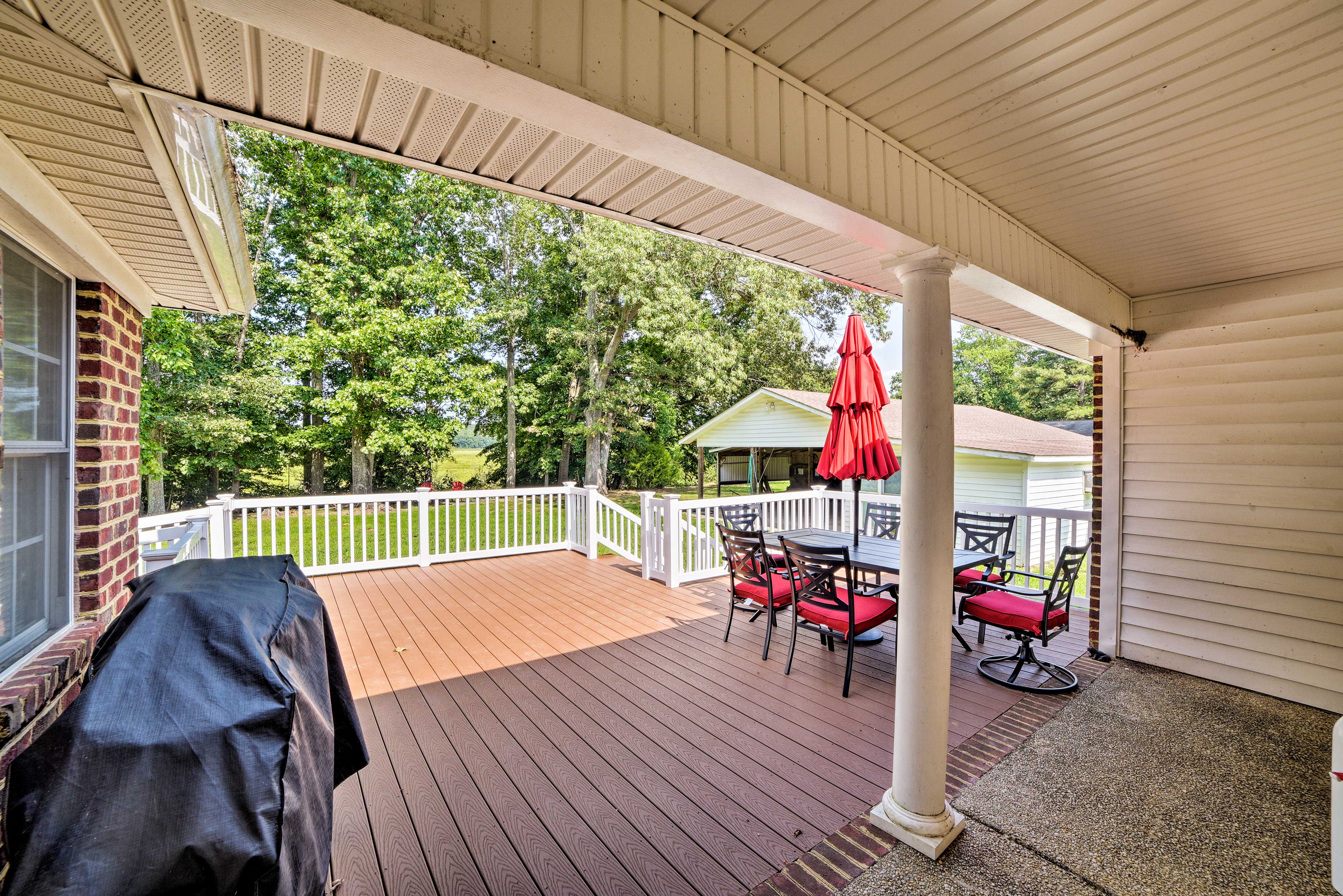 The deck offers open-air and shaded options.