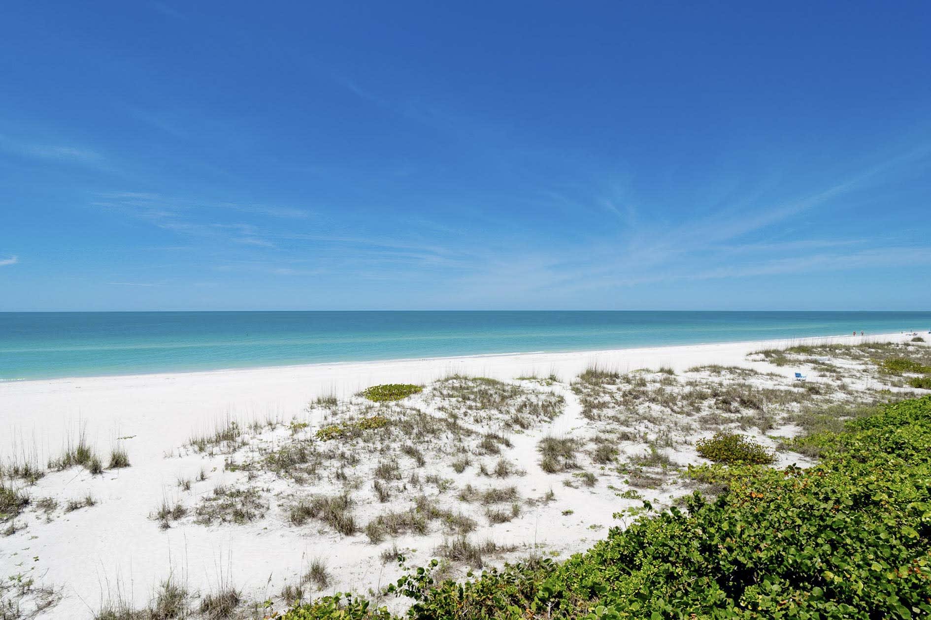 Relax on the silver Gulf of Mexico sands.