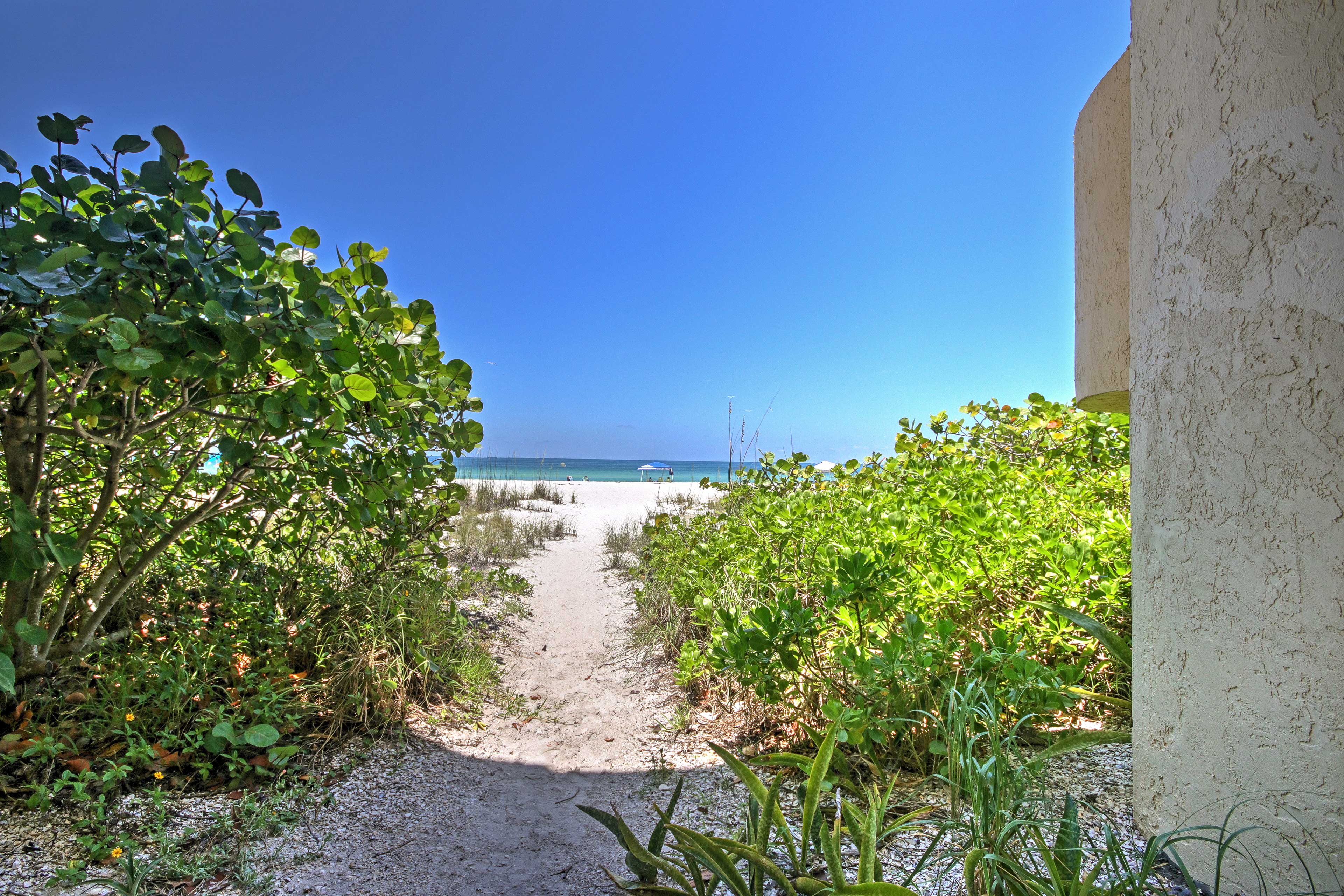 A convenient path allows for easy access to the beach.