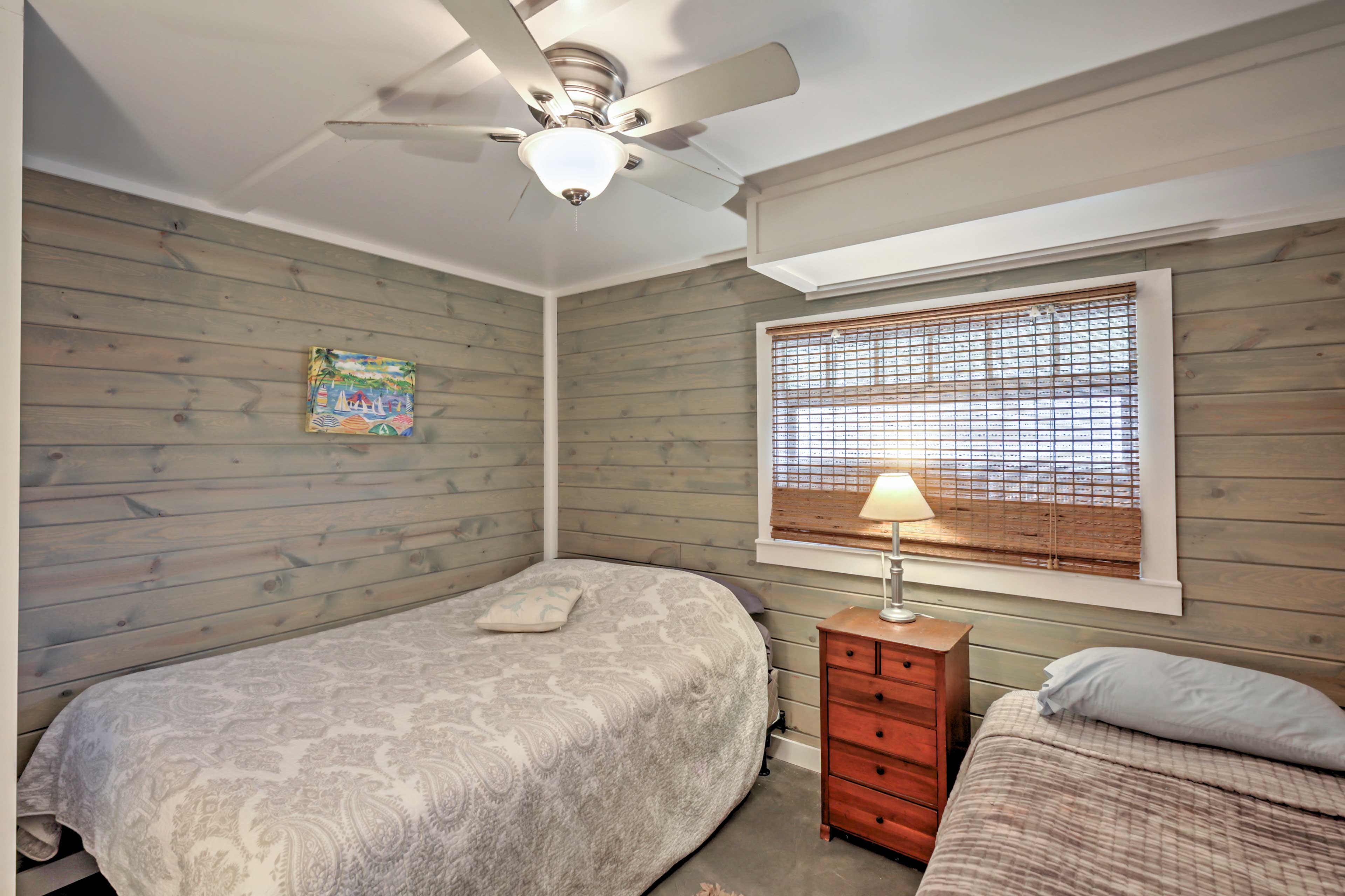 The second bedroom has a queen-sized bed and twin-sized bed.