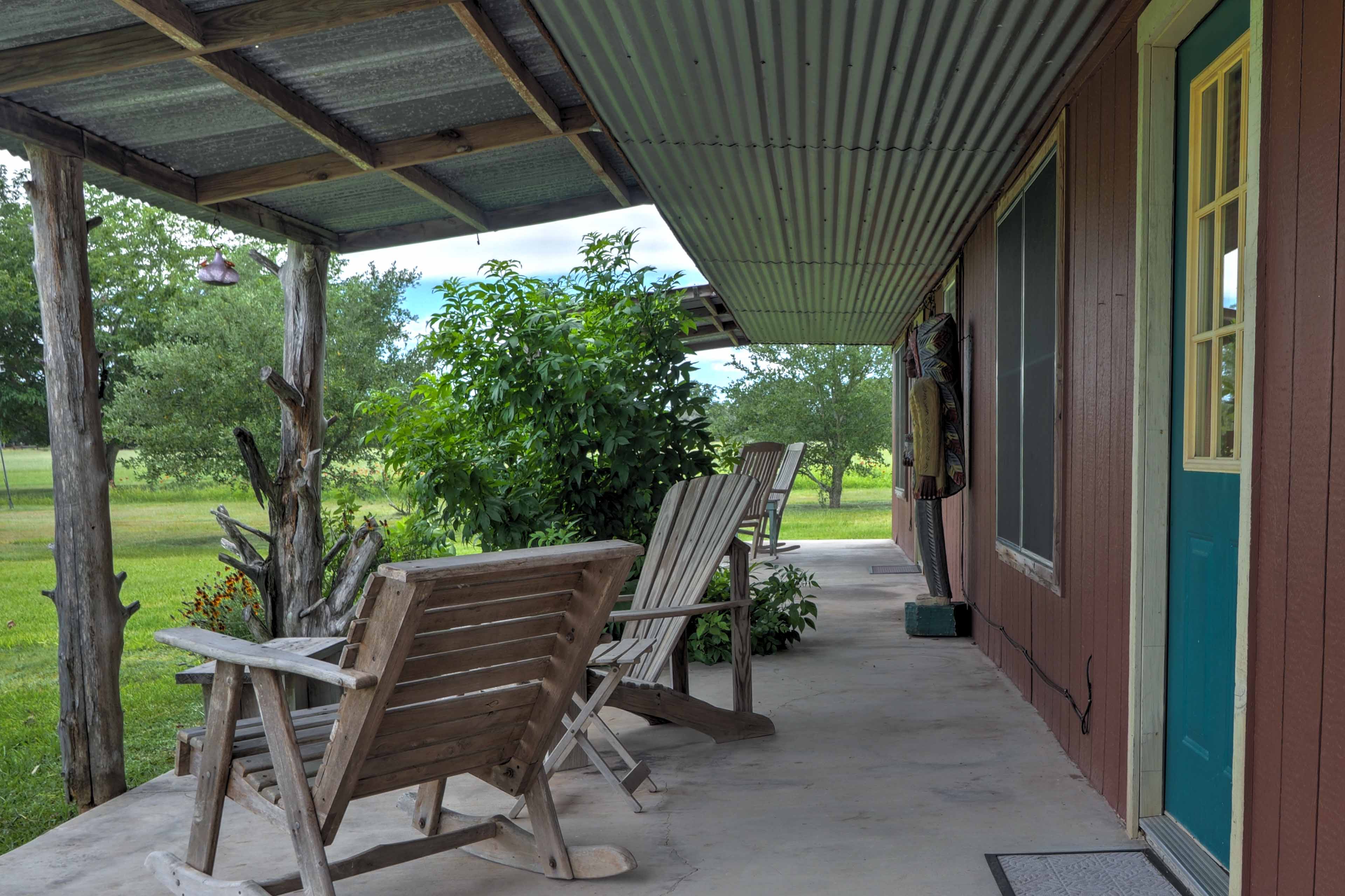 The porch is covered so you can enjoy the outdoors in any weather.