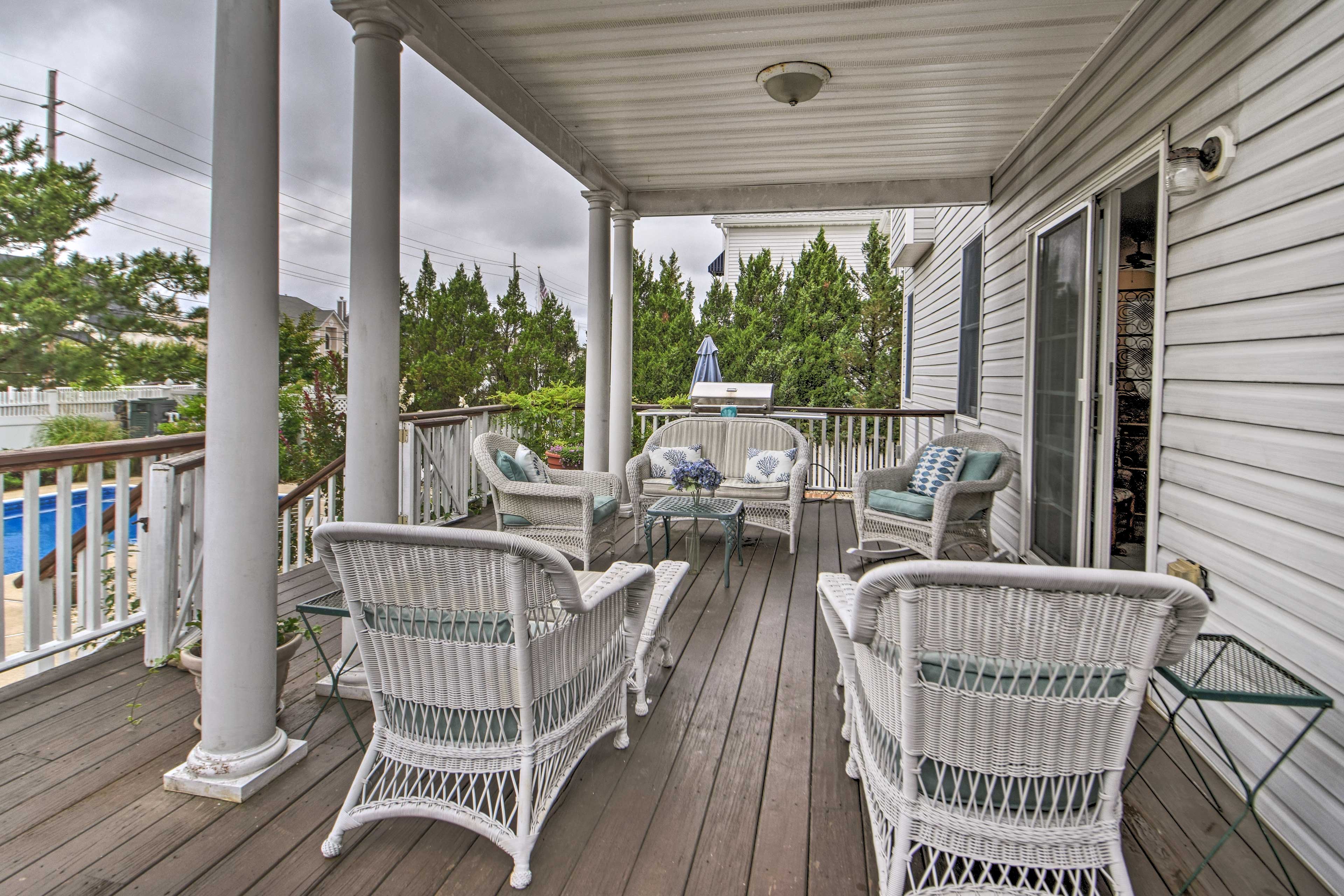 There is a gas grill on the deck.