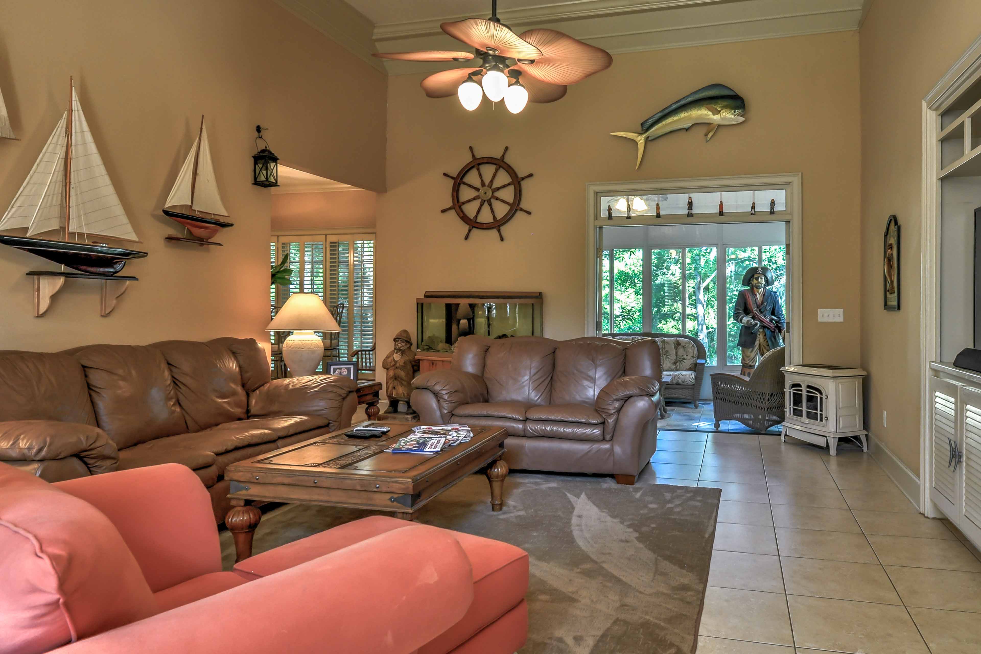 Lounge on the couches while watching the flat-screen cable TV.