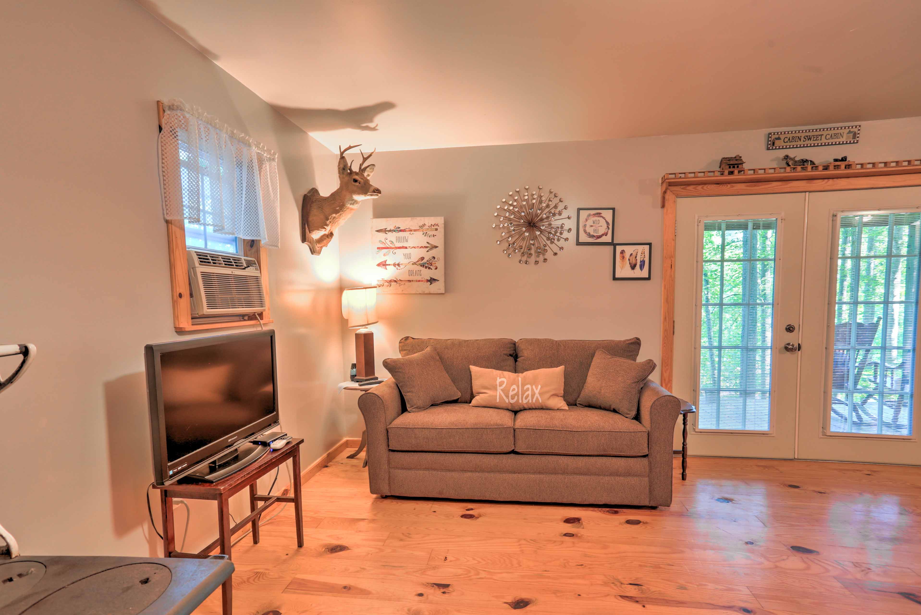 The double glass doors allow plenty of sunshine to fill the cabin.