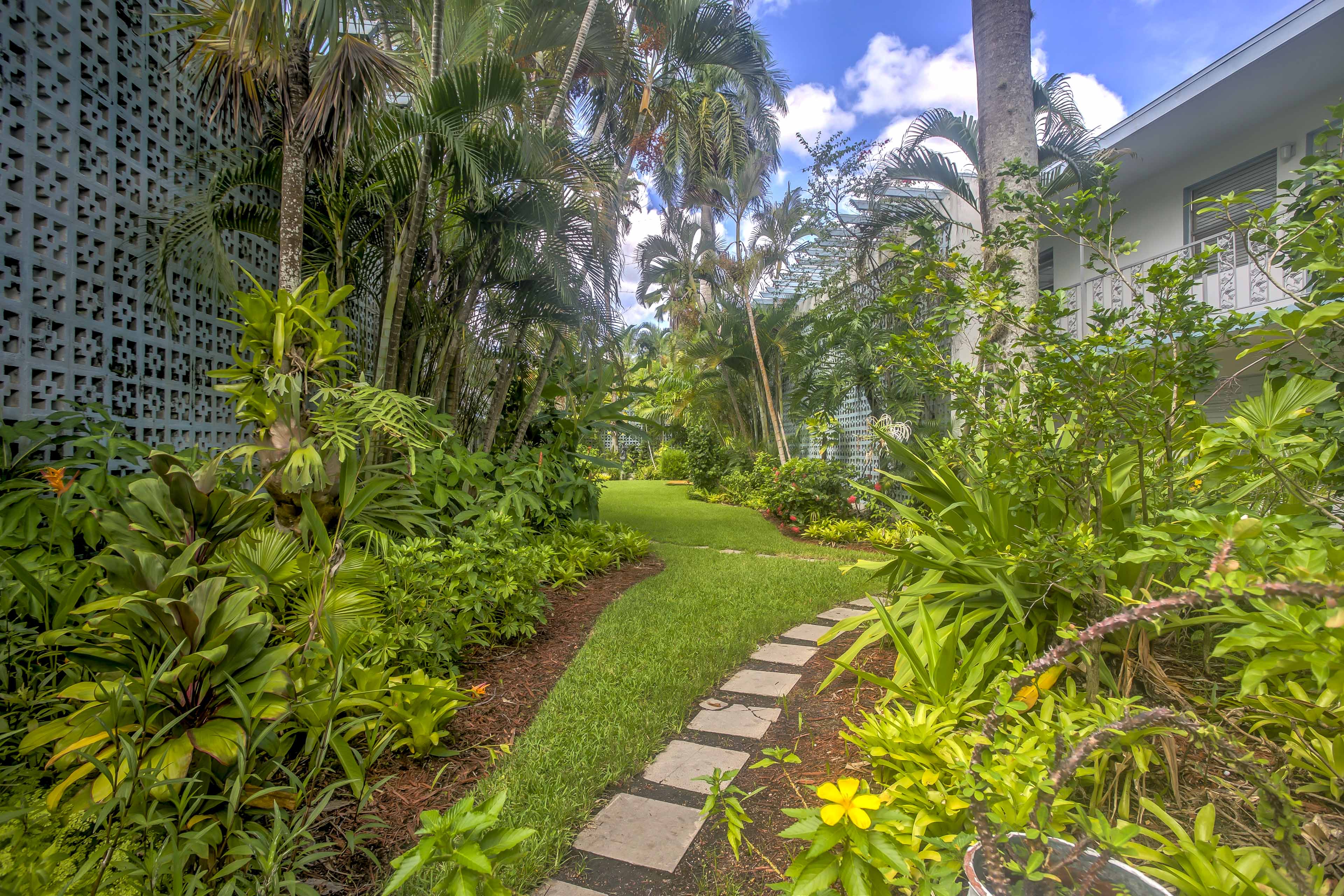 Lush foliage surrounds the complex.