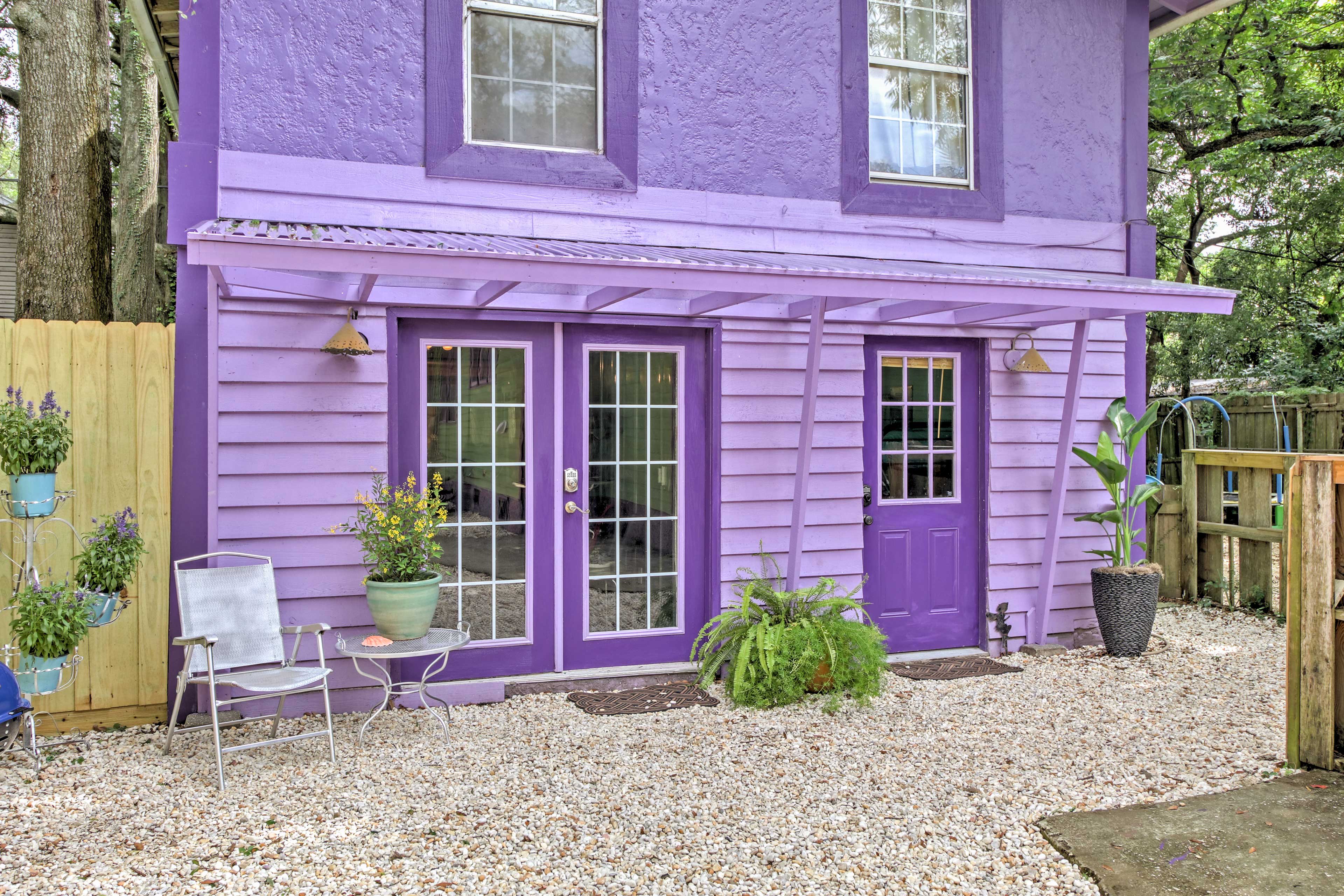 The apartment is on the first floor of a historic house.