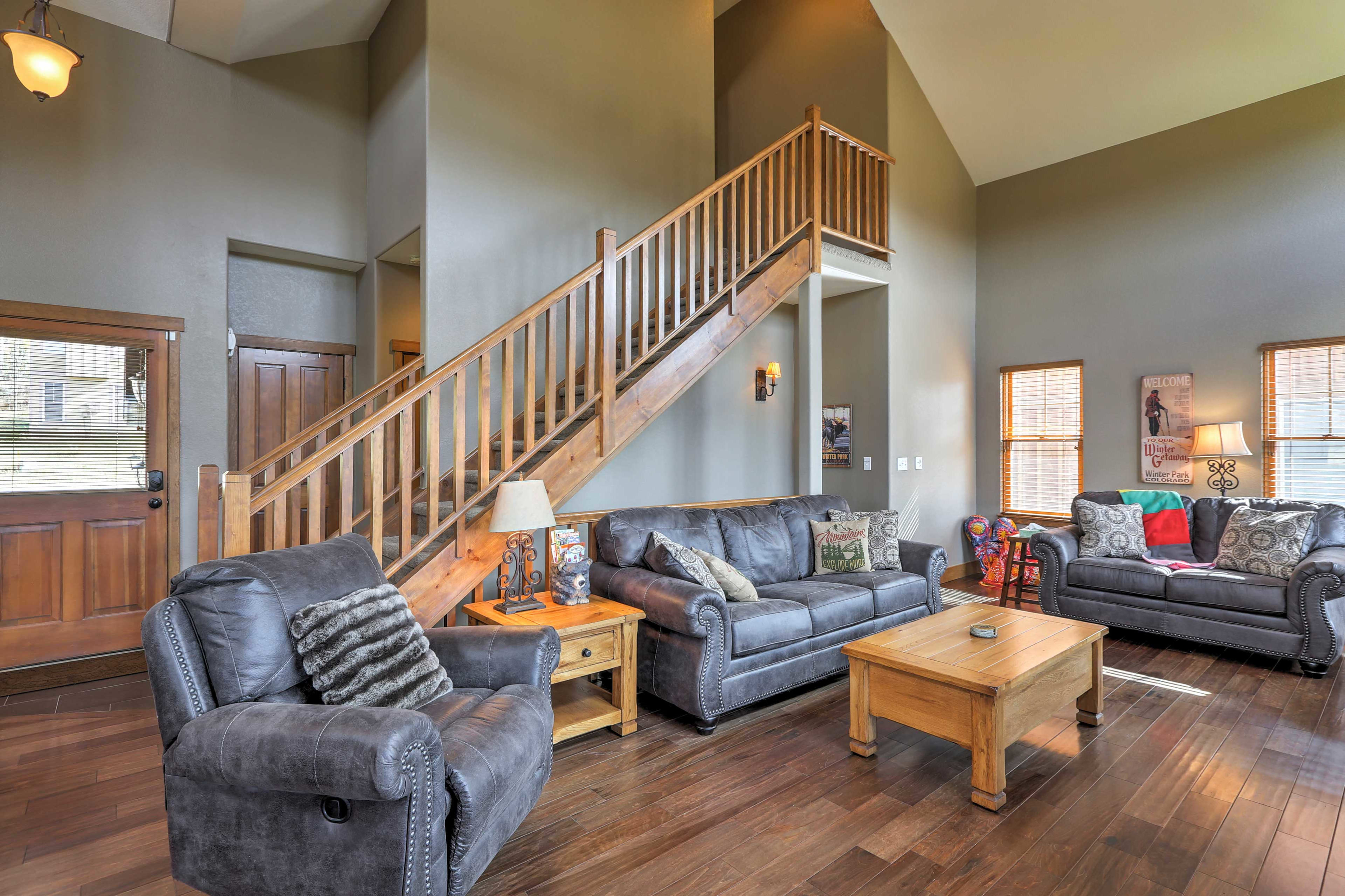 Kick back and relax on one of the couches in the living area.