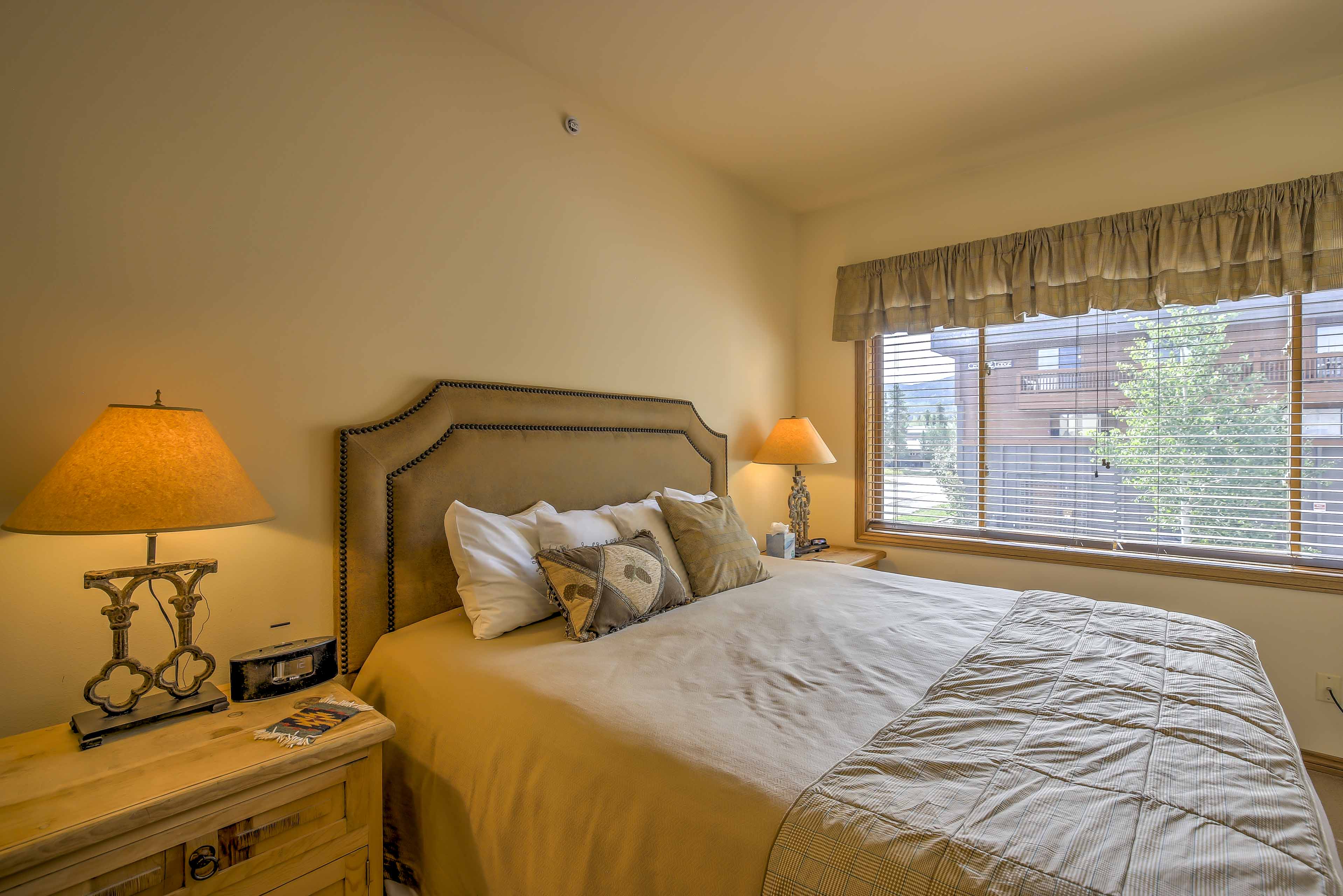 Two guests will fall fast asleep in the king-sized bed in the master bedroom.