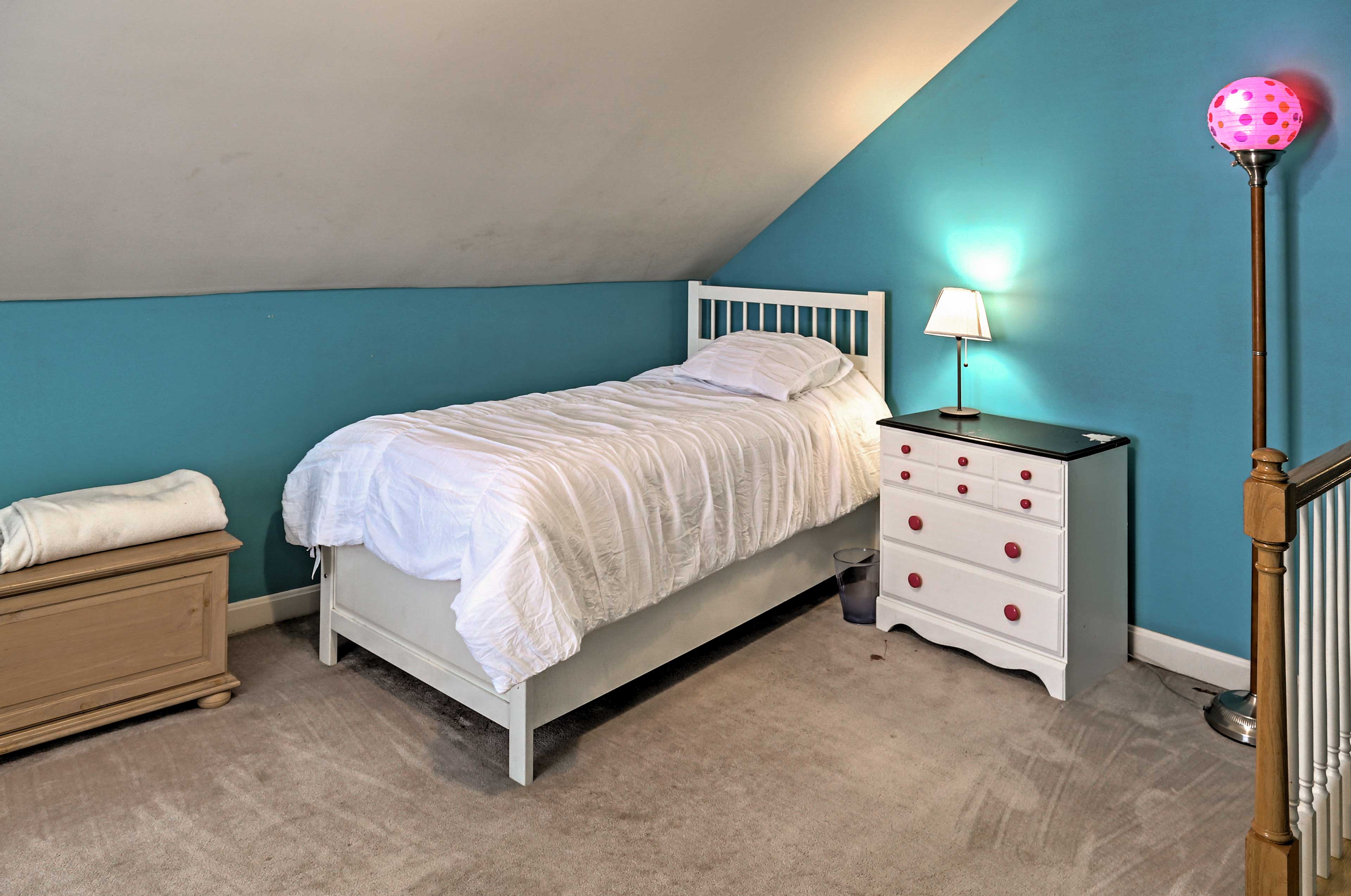 Kids will love this vibrant room with a twin bed.