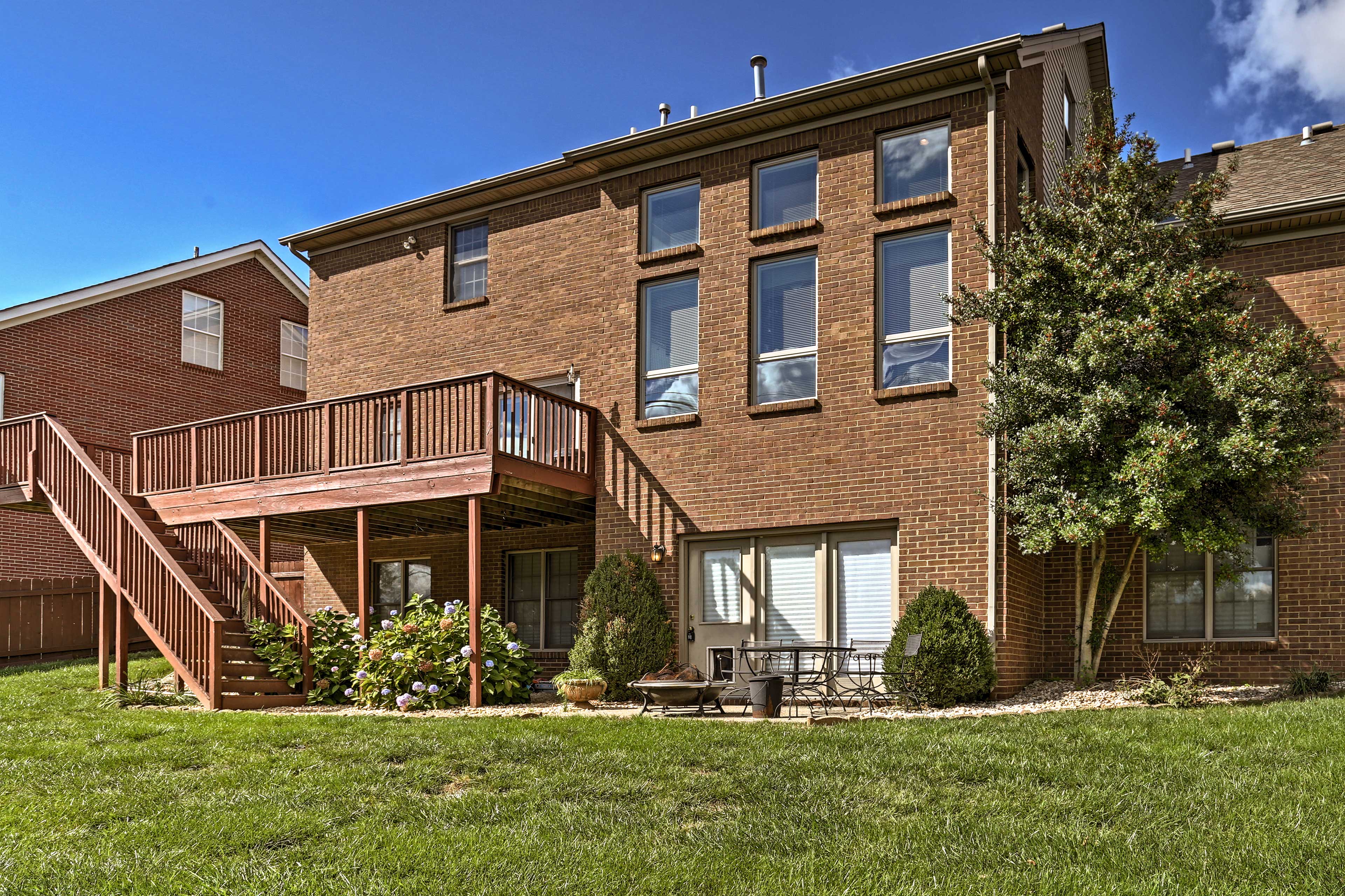 This spacious home has a large backyard for kids to run around and play.