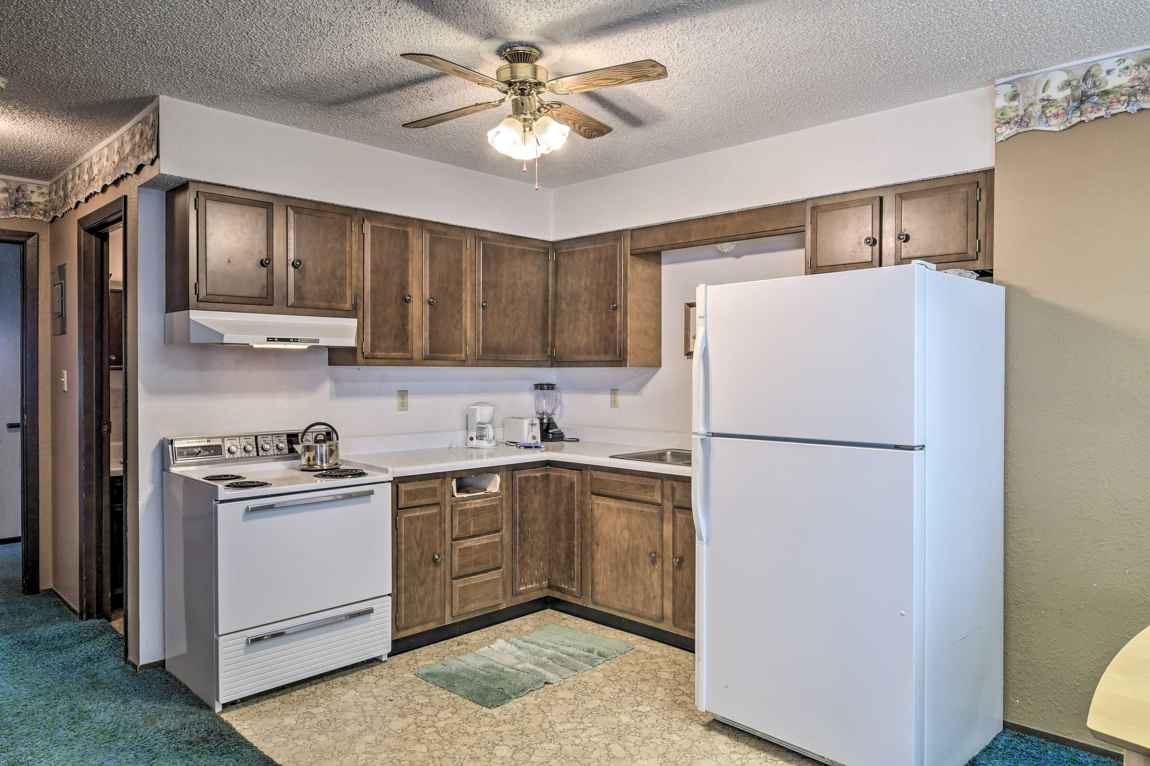 The well-equipped kitchen includes everything needed for meal prep.