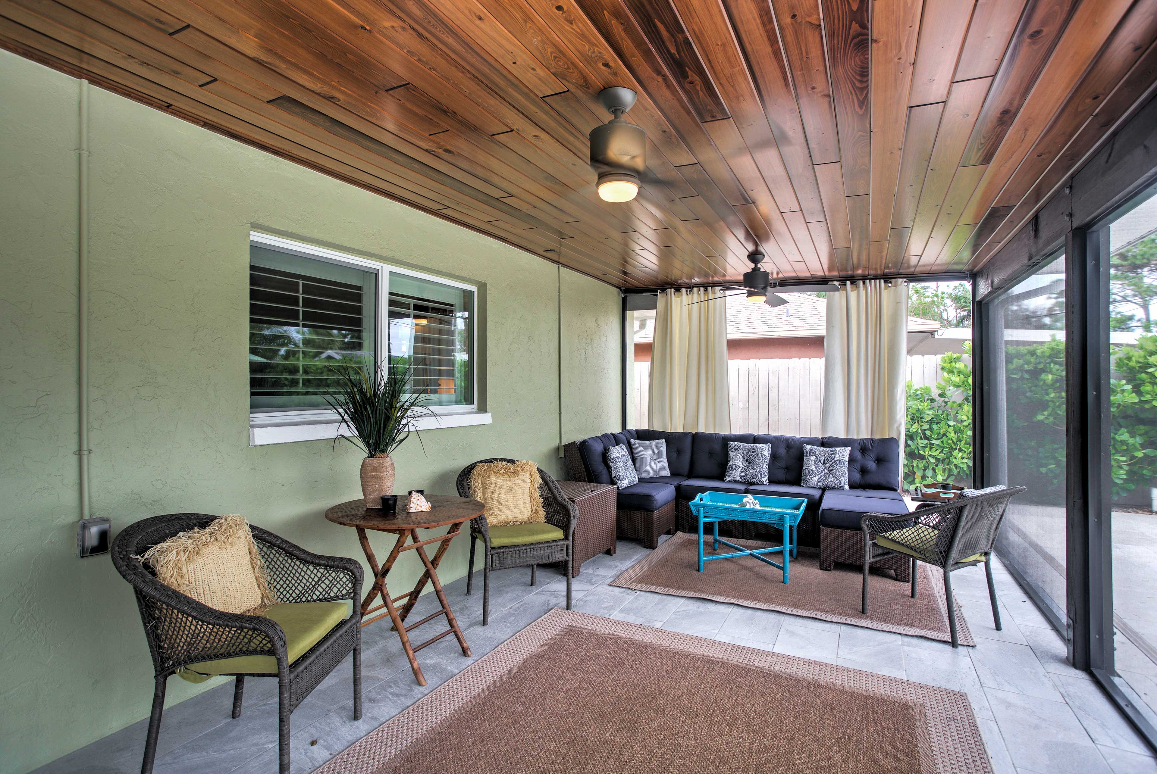 A screened lanai provides shade for cooling off.