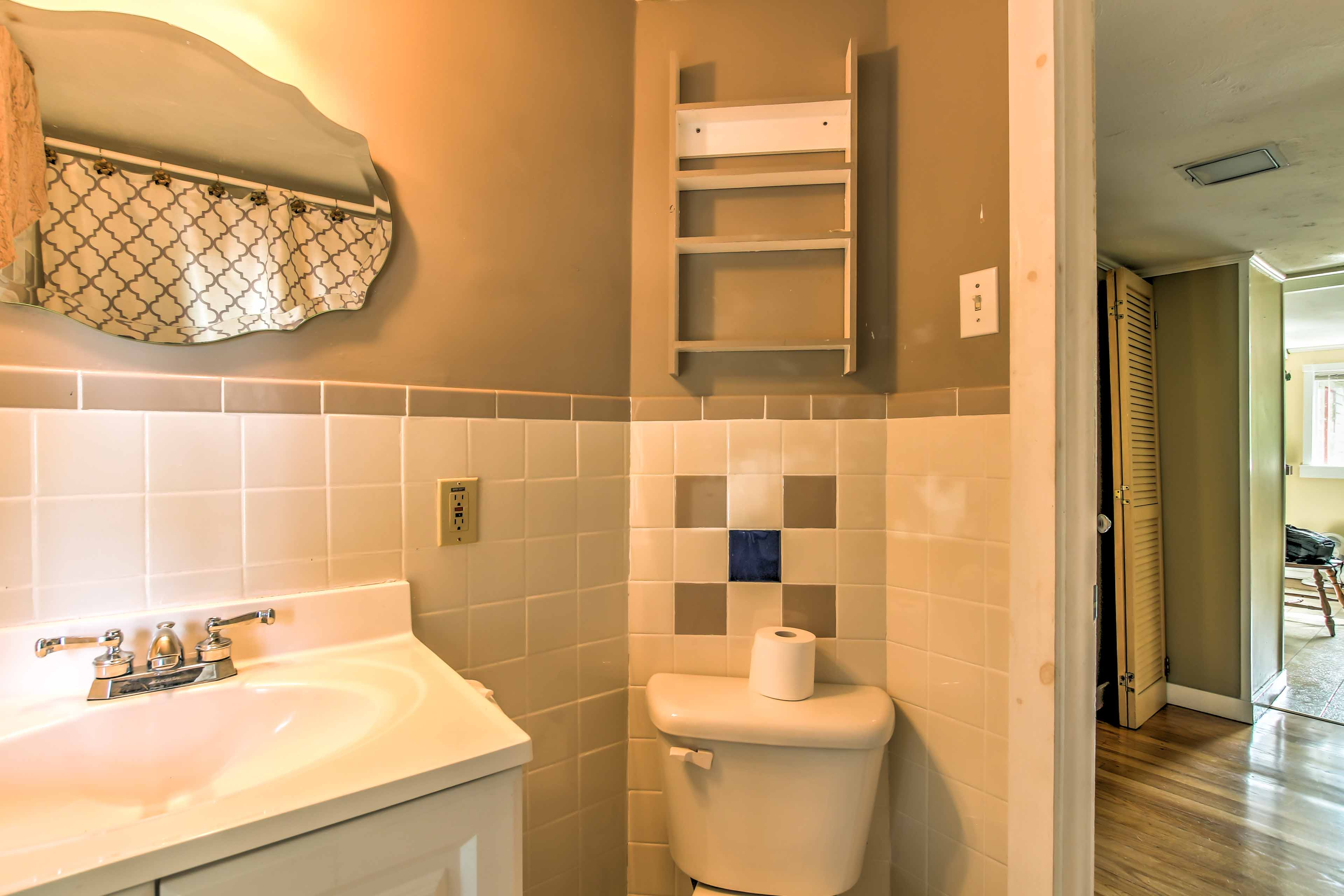 The bathroom has been totally renovated and sparkles with cleanliness.