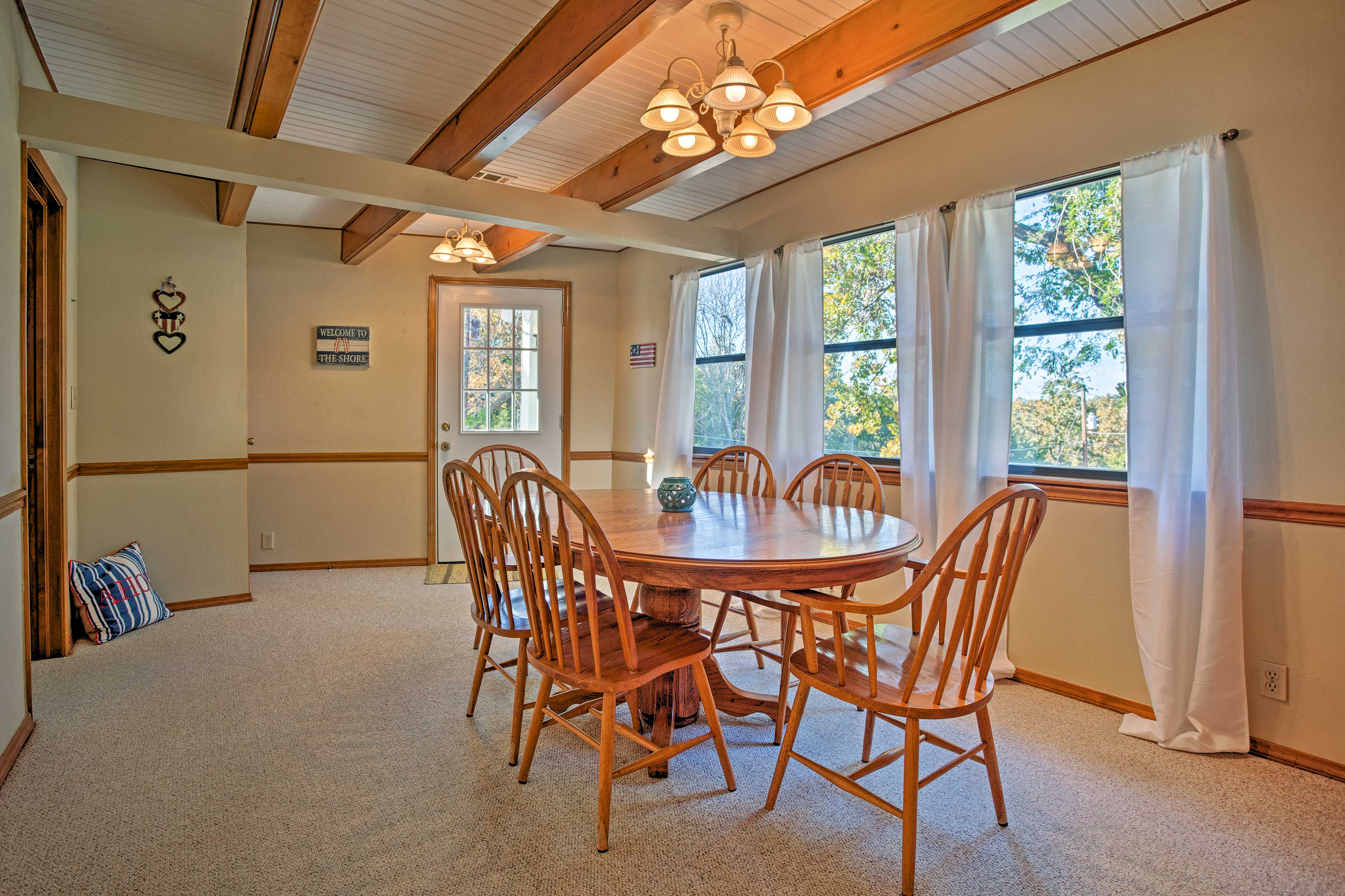 Another dining table provides more space to dine.