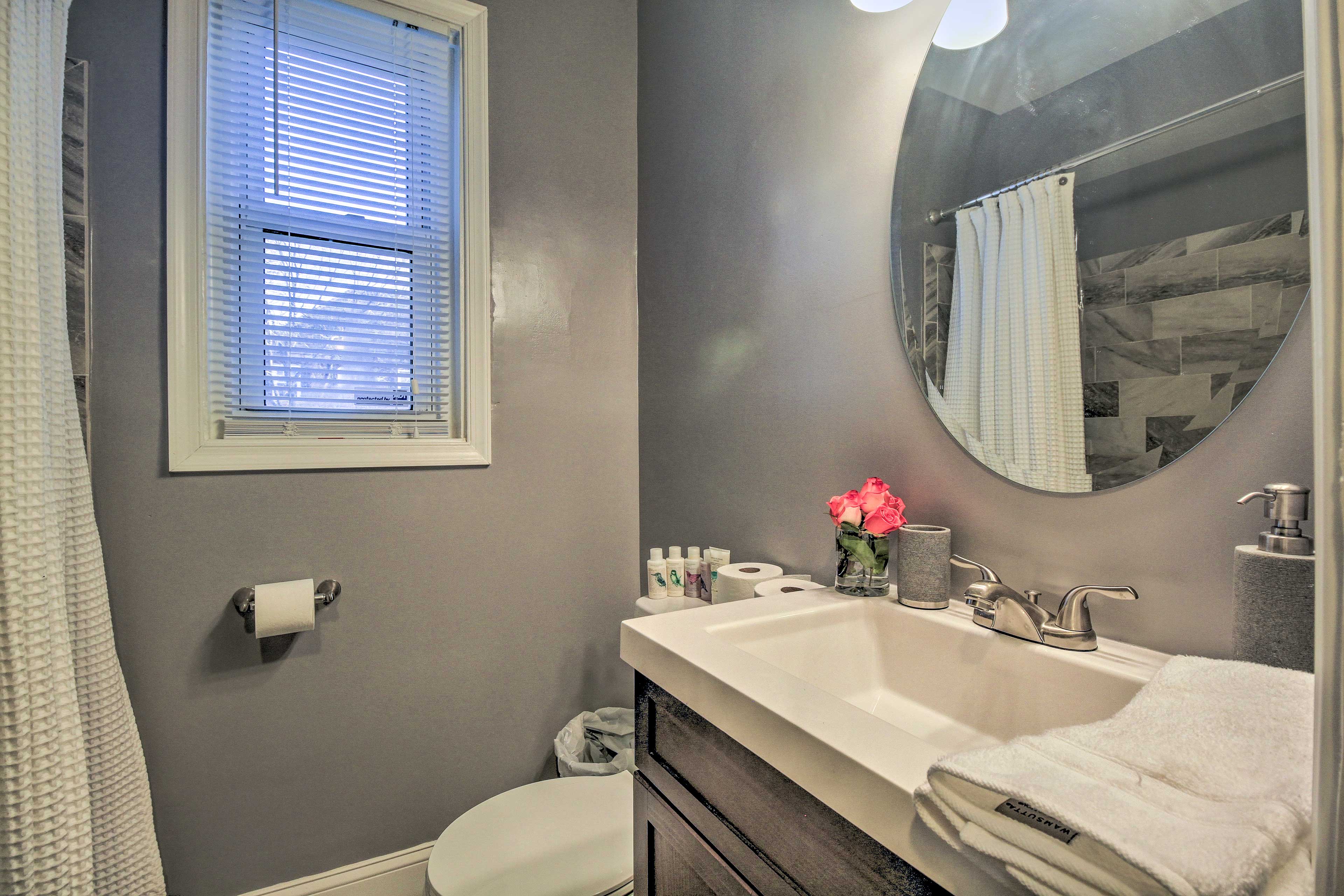 Wash up in the full bathroom's single vanity before dinner.