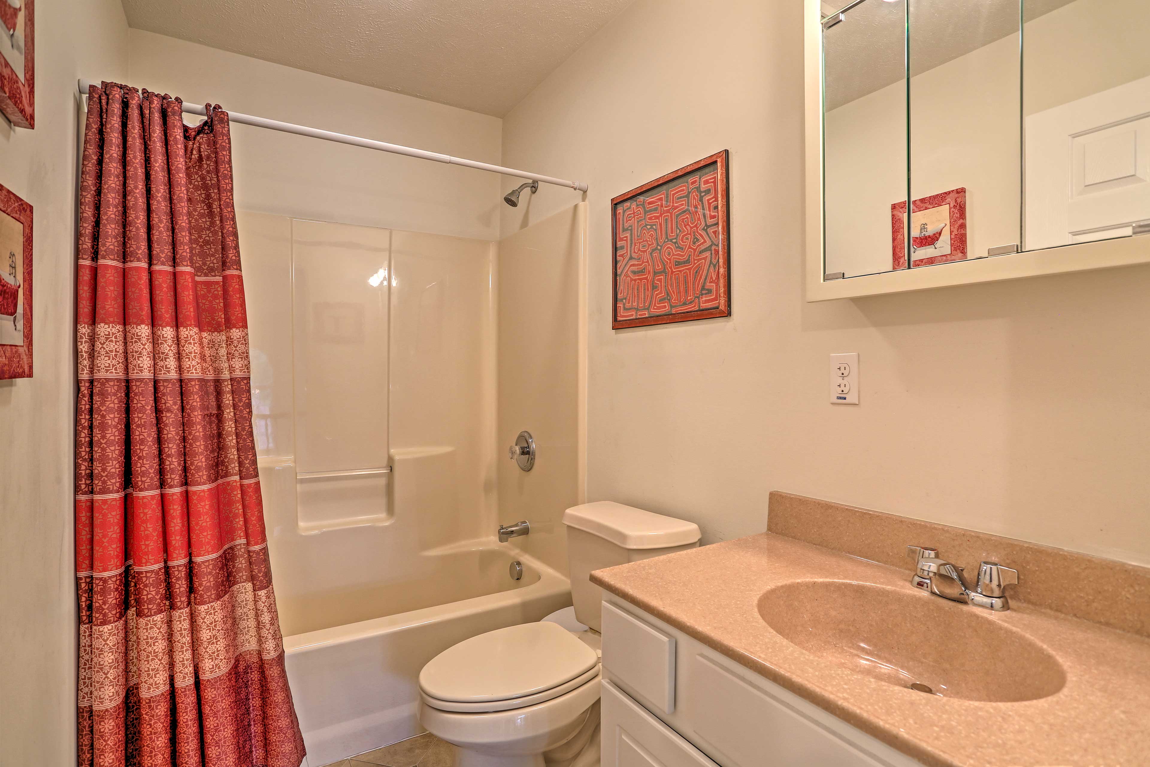 A shower/tub combo completes this second full bathroom.