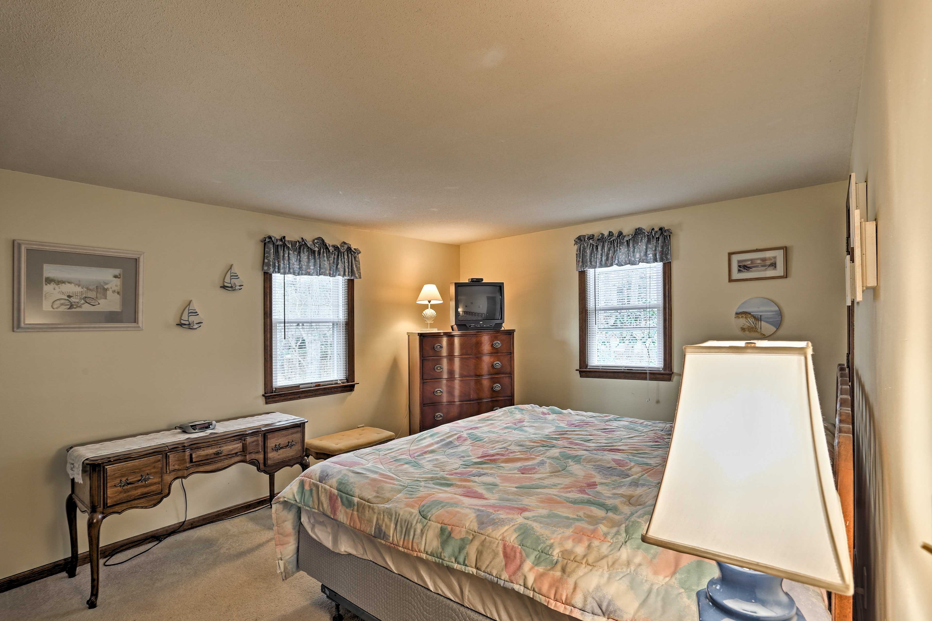 The master bedroom offers a king bed for the heads of the household.