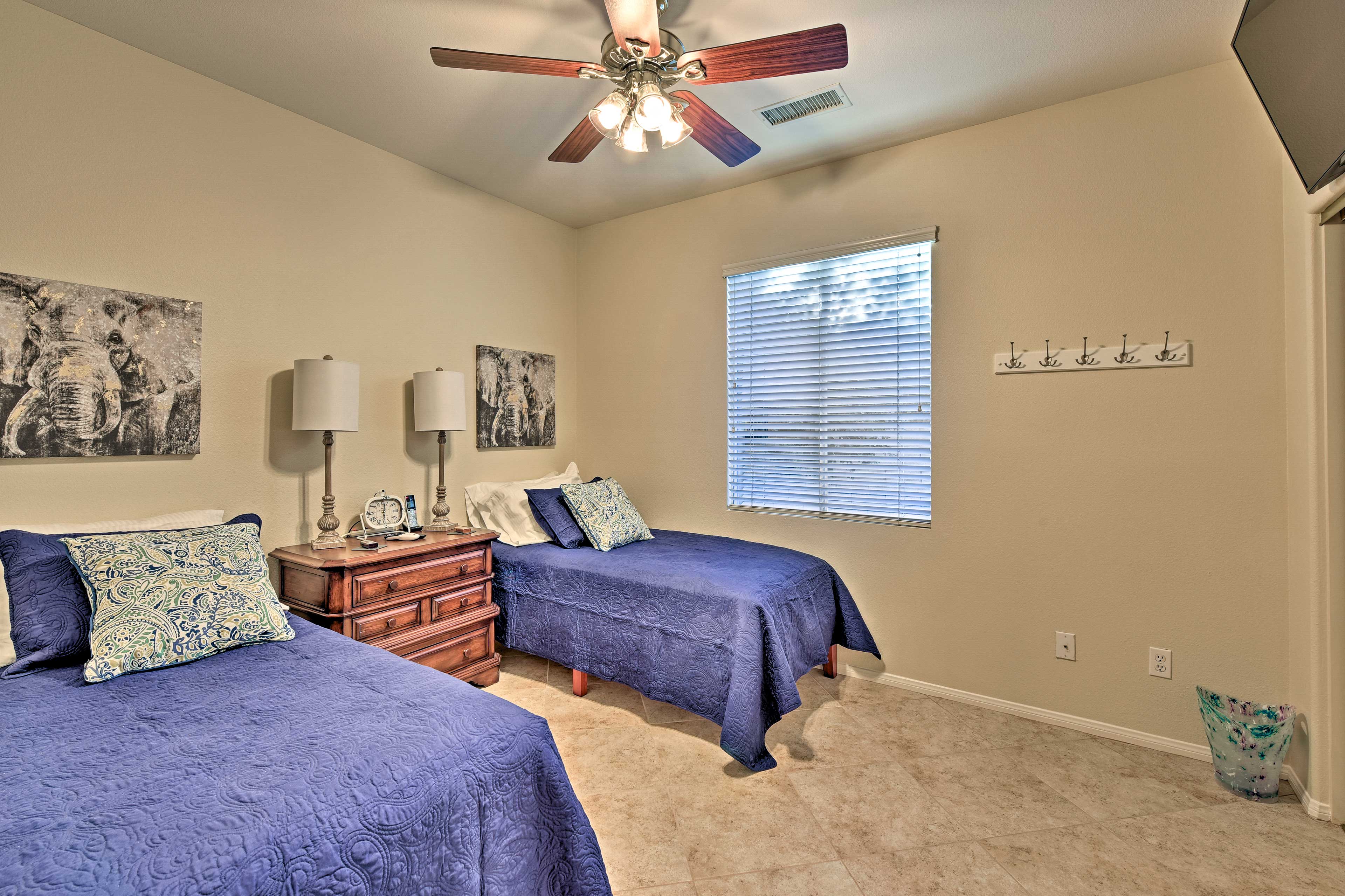Send the kids off to sleep in this third bedroom housing 2 twin-sized beds.