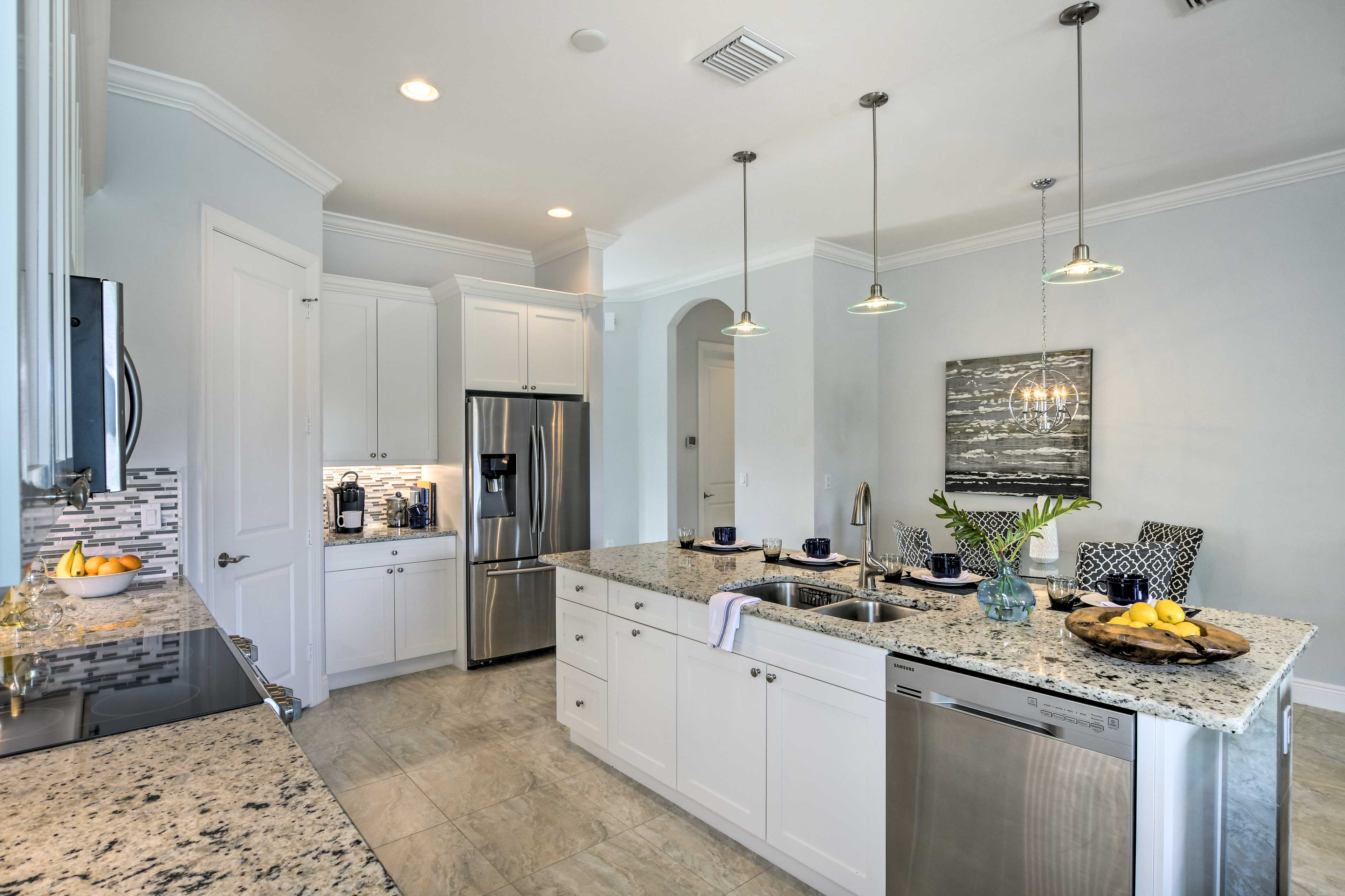 Ample counterspace makes meal prep a breeze in the fully equipped kitchen.