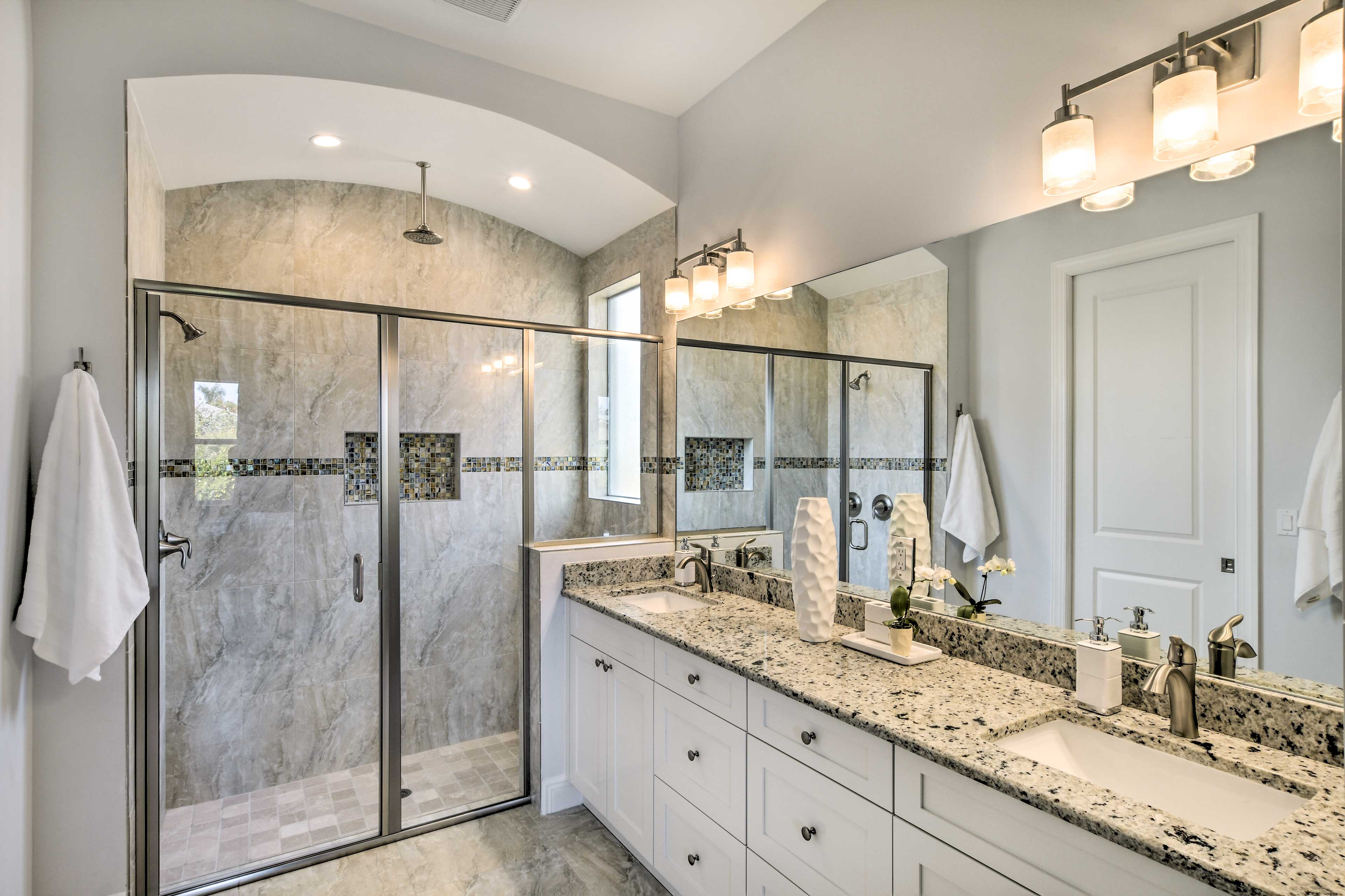 Rinse off in the  gorgeous walk-in shower.