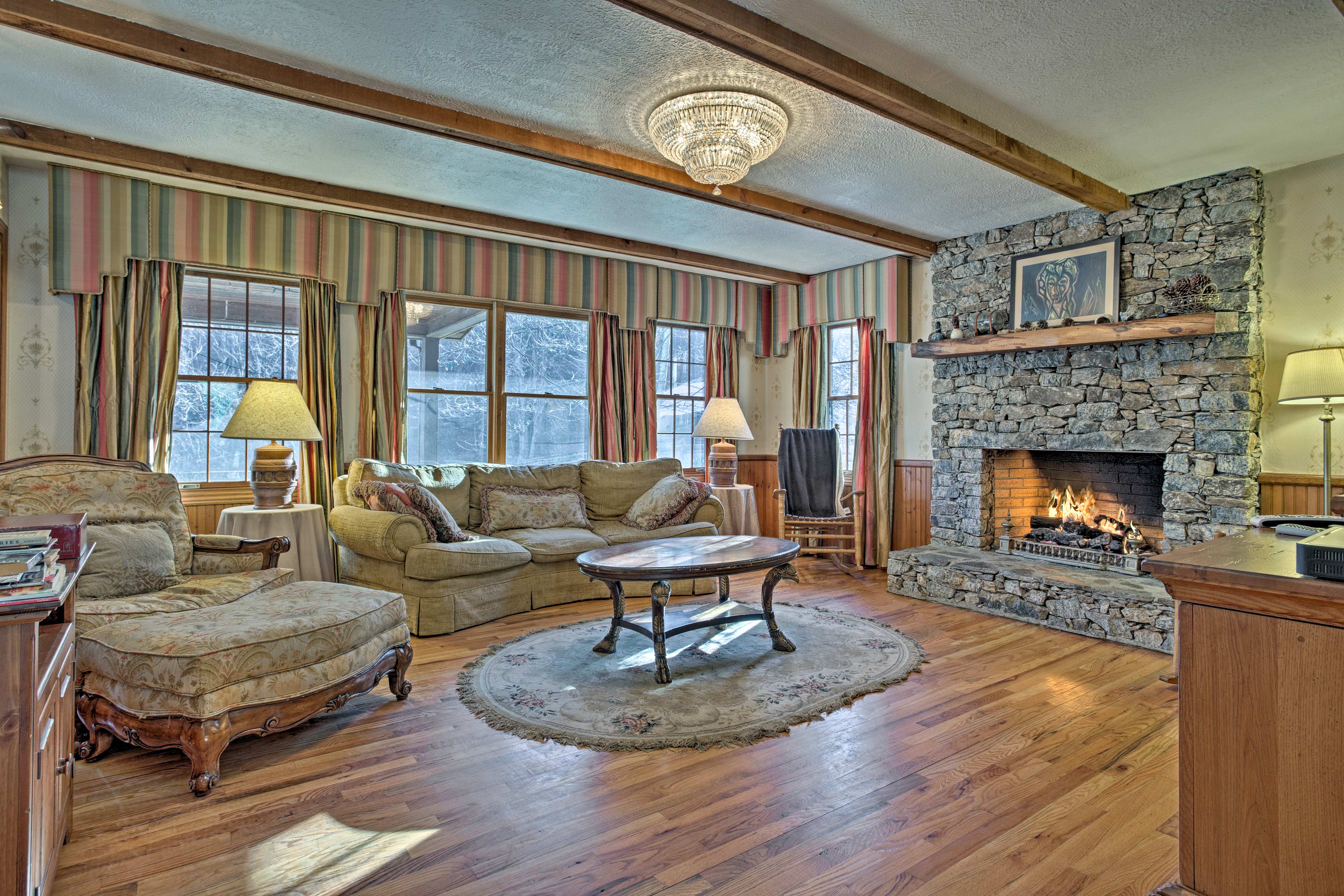 Make yourself at home in this rustic cabin featuring hardwood floors.