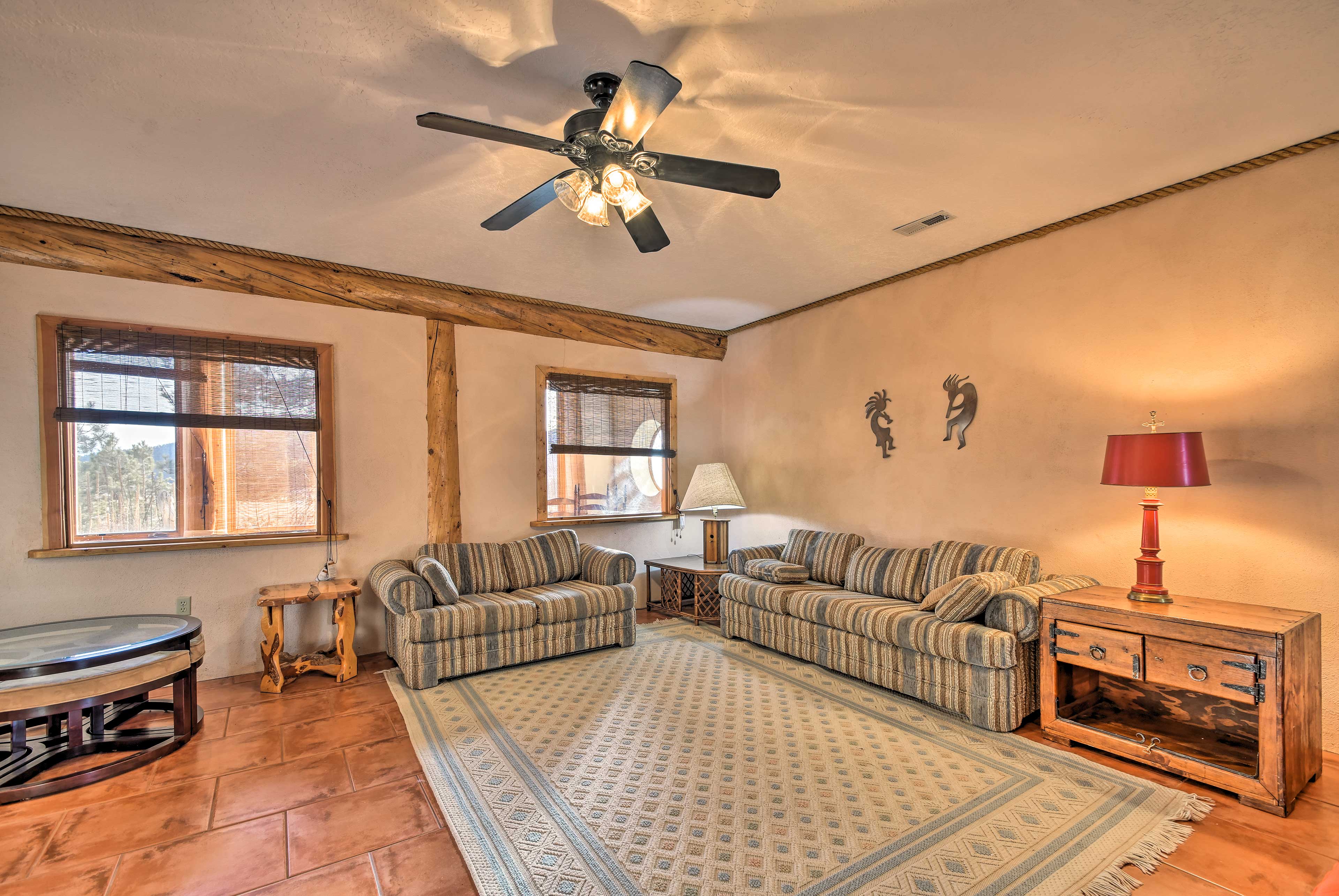 One of the couches doubles as a queen sleeper sofa to accommodate 2 travelers.