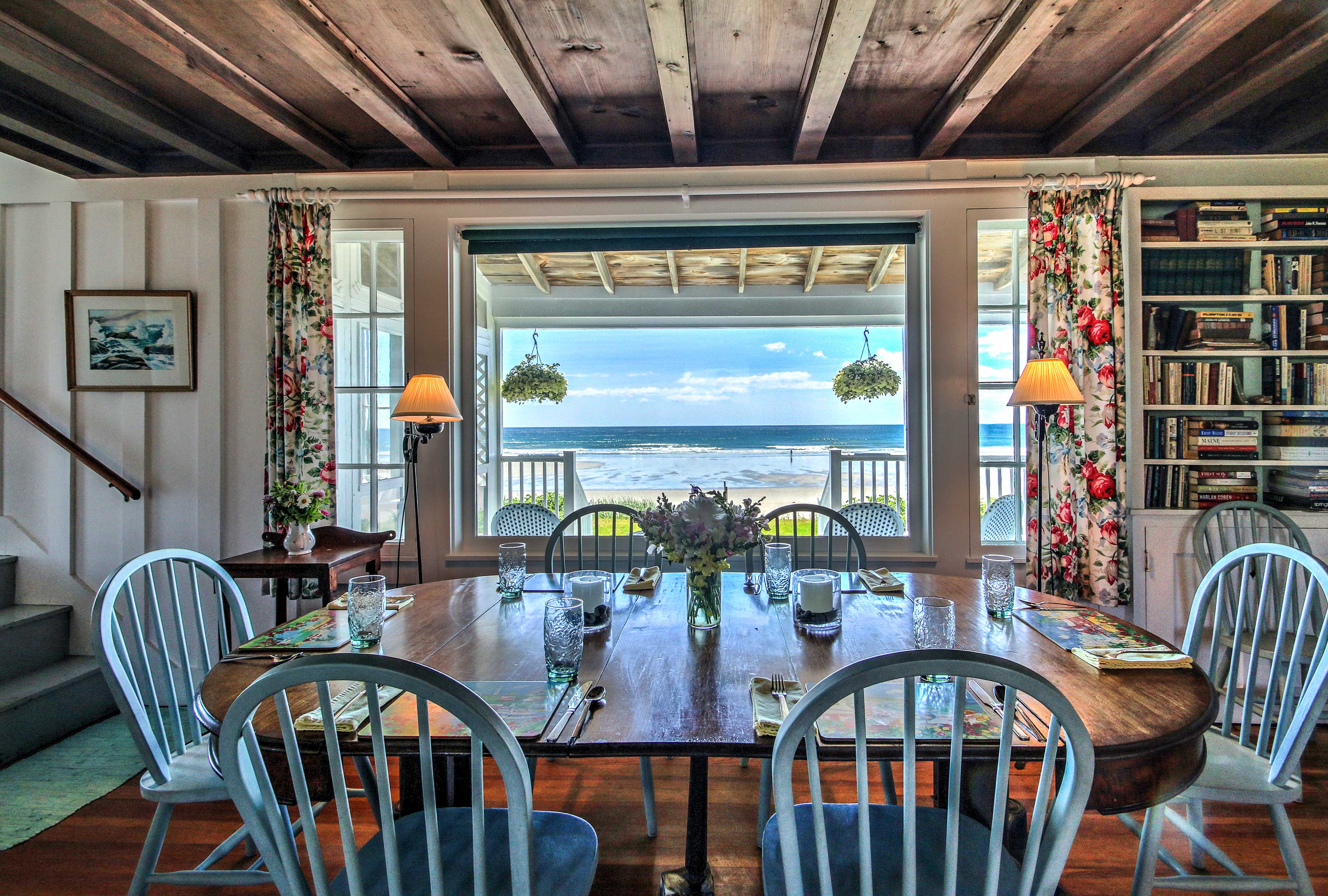 Savor home-cooked meals at the dining table beside breathtaking ocean views.