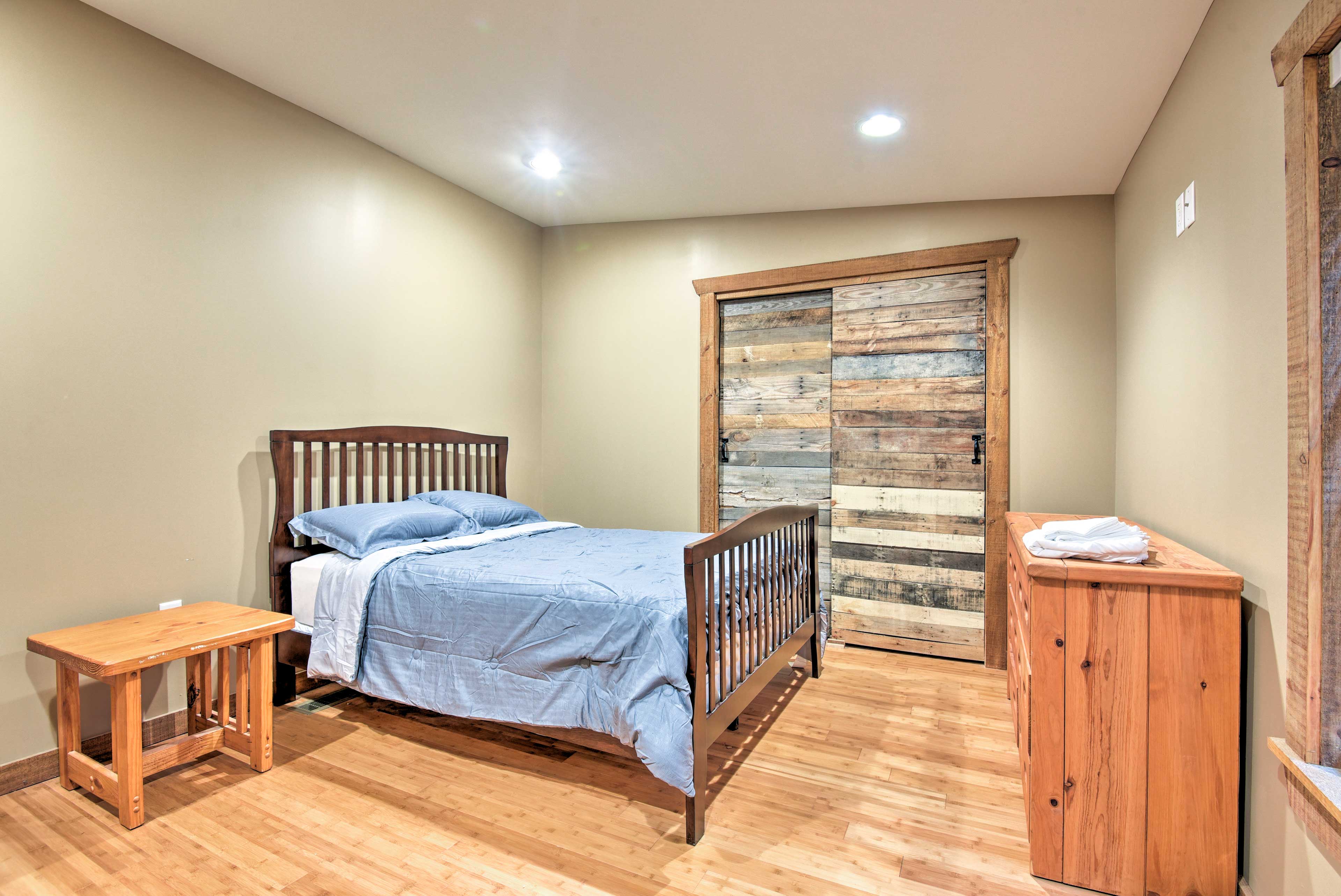 This bedroom has a queen-sized bed.