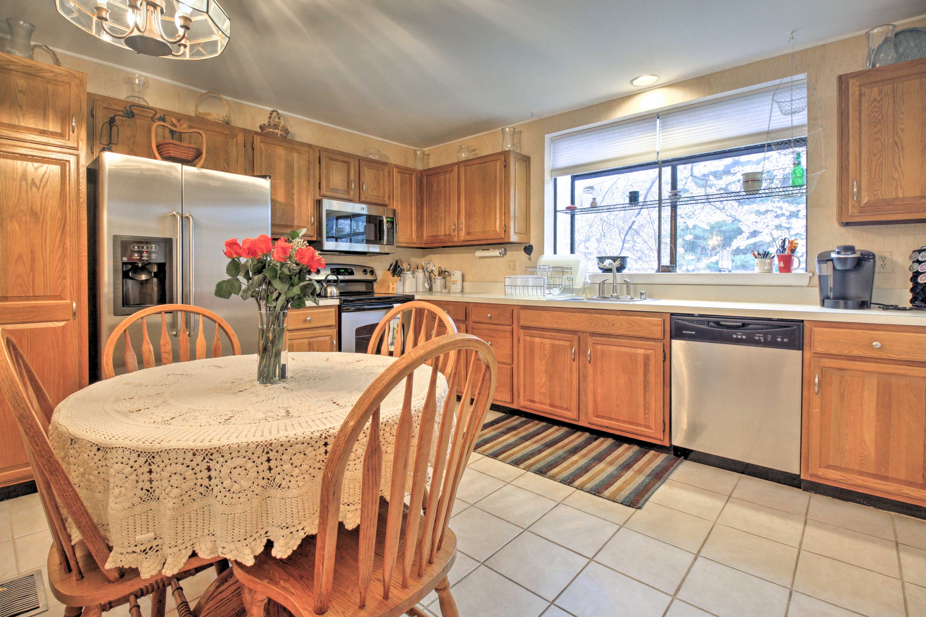 Large granite counters make meal prepping a breeze.