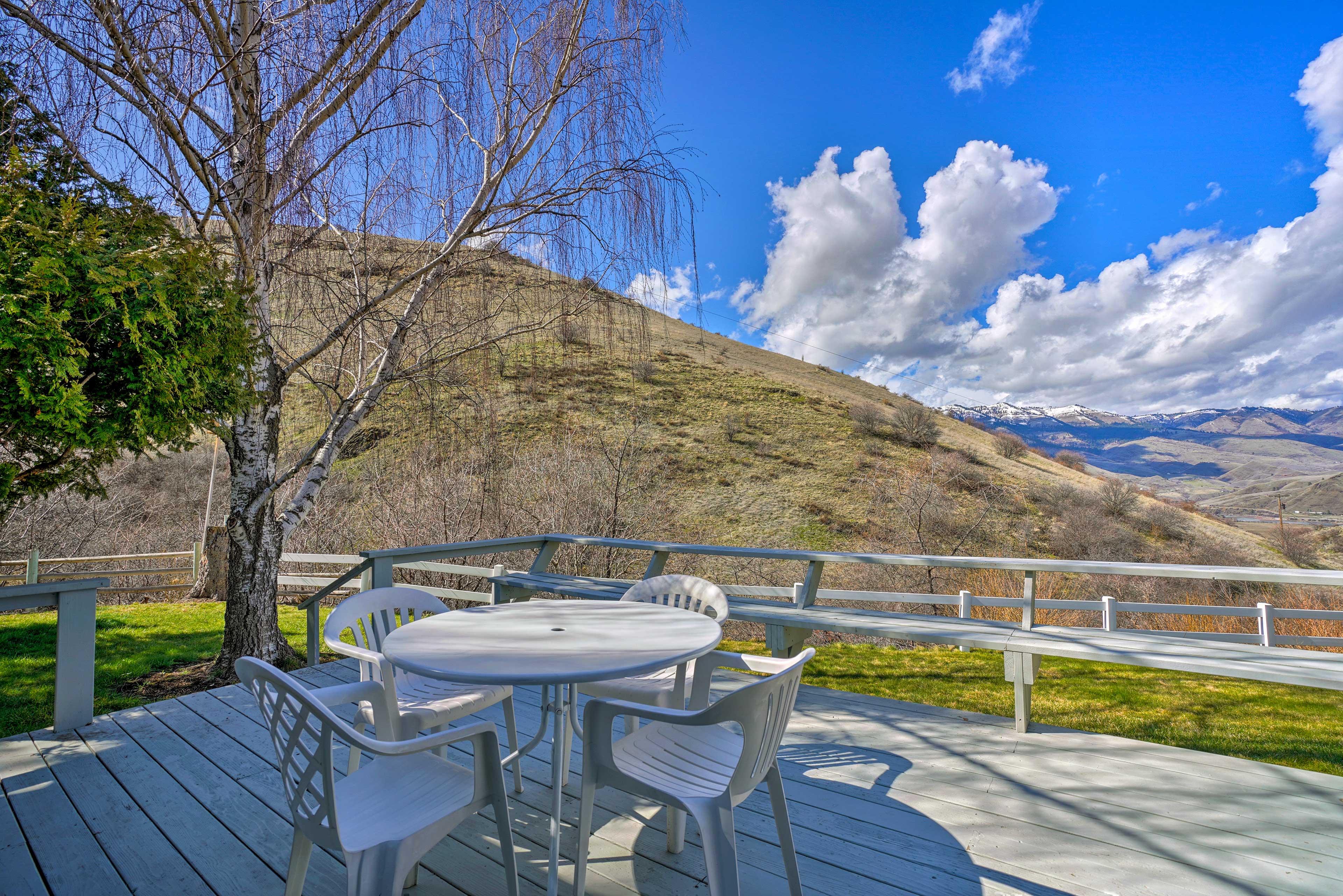 Eat dinner outside on the spacious back deck with views.