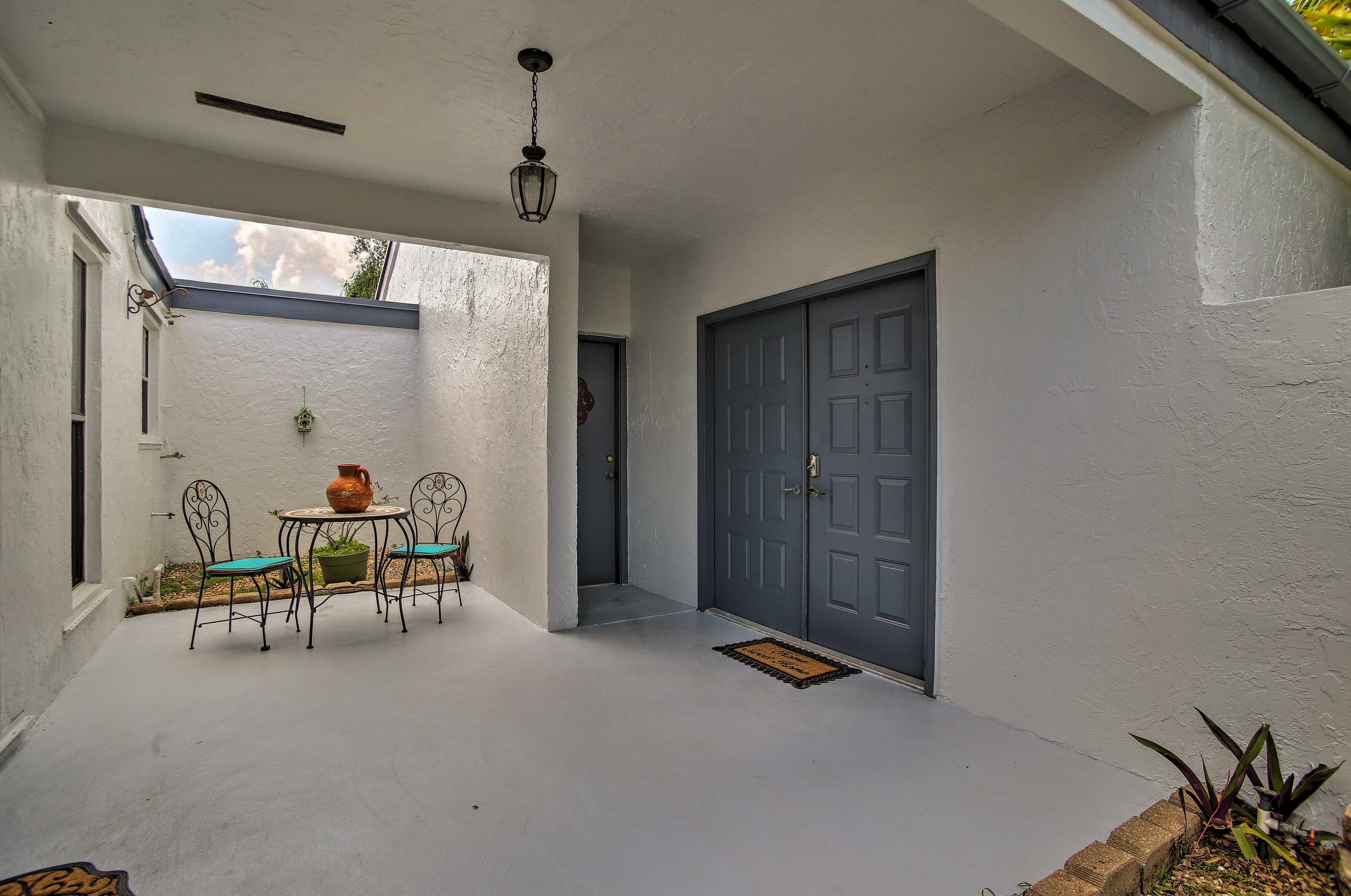 The covered patio is a great place to enjoy some fresh air.