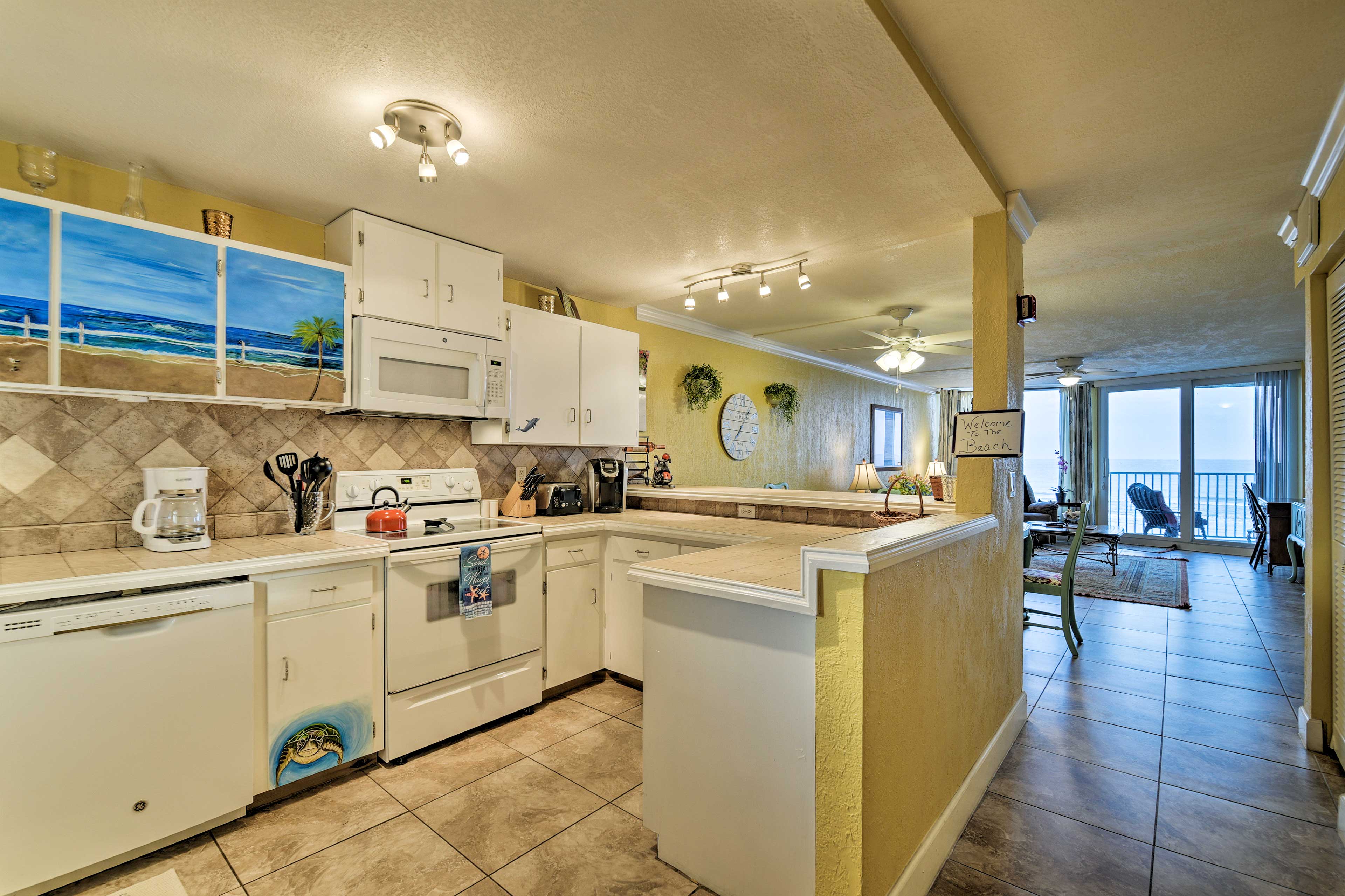 Ocean views fill the interior and and the hand-painted cabinets.