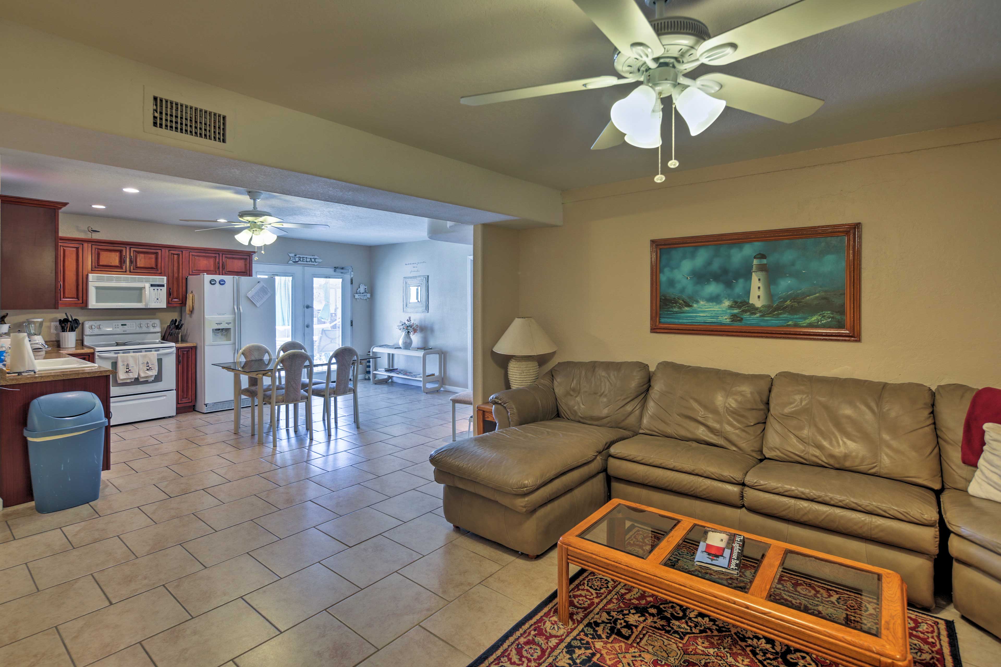 The living room opens into the large kitchen space.