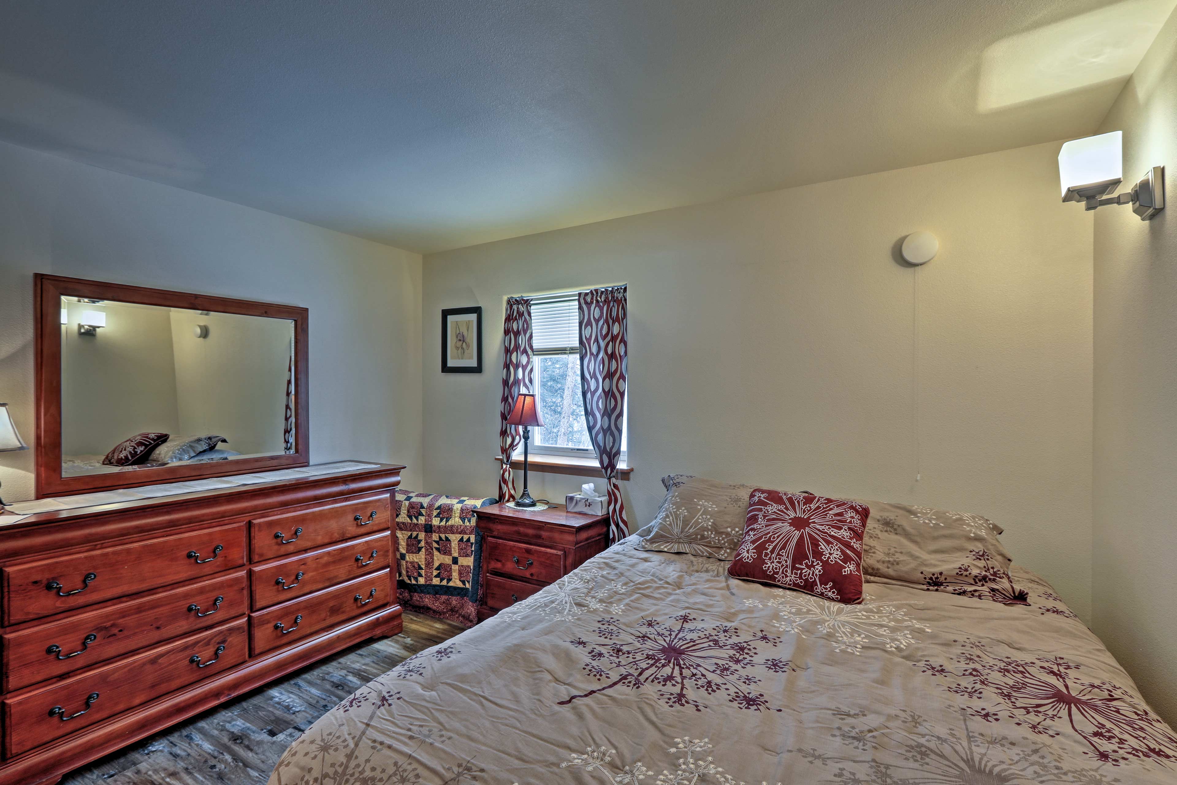 Wood furnishings highlight the second bedroom.