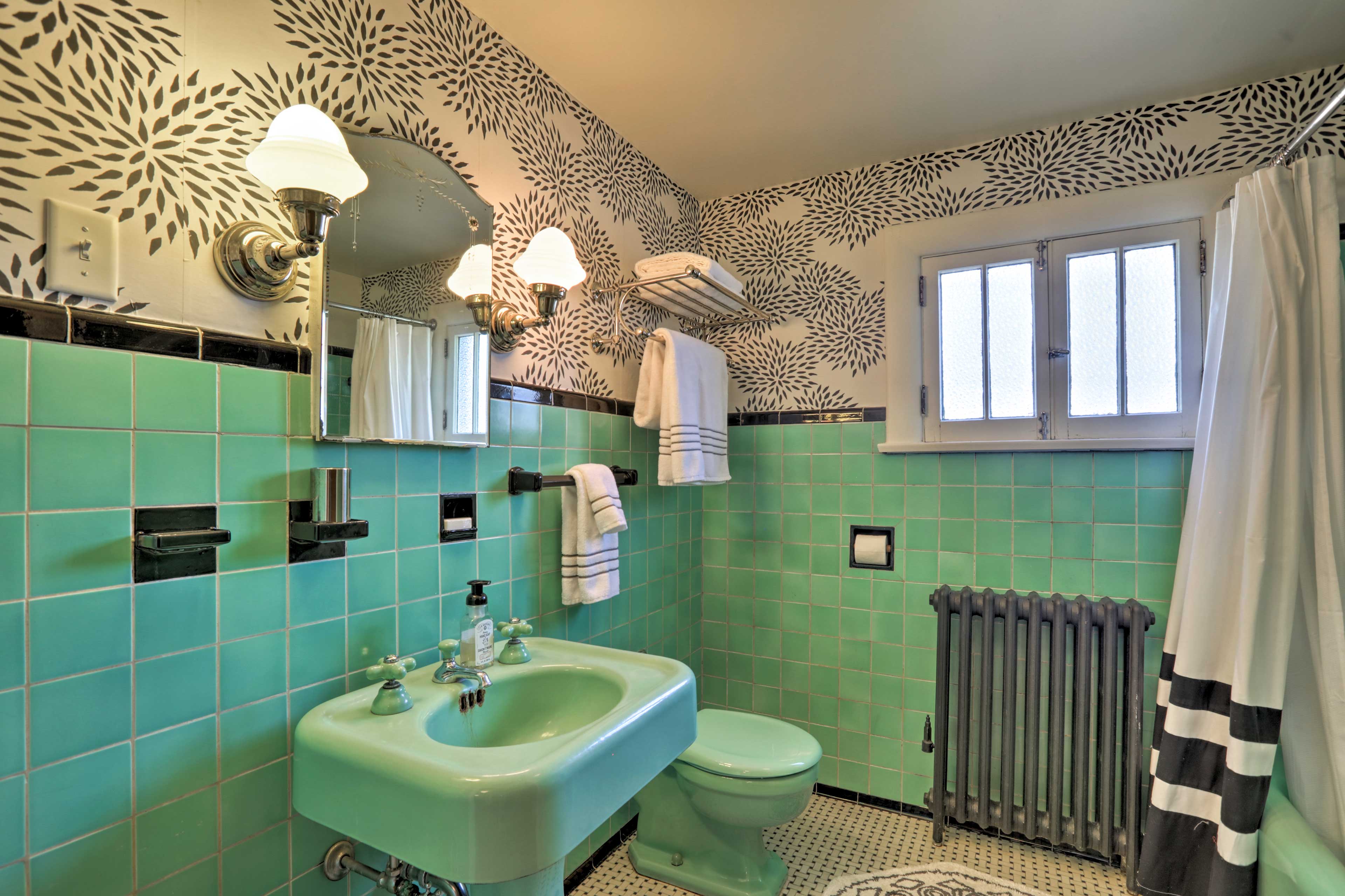 Is pink not your color? Choose to get ready in this fun green bathroom.
