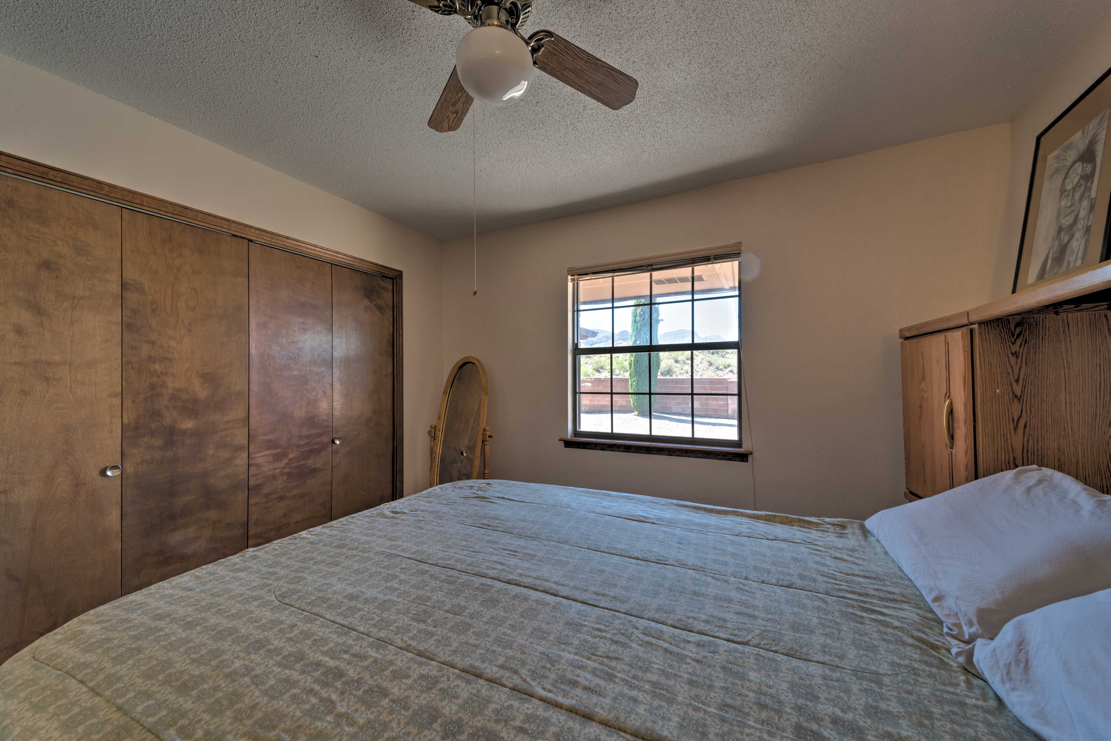 Native American and nature-themed art are homey touches in this cozy room.