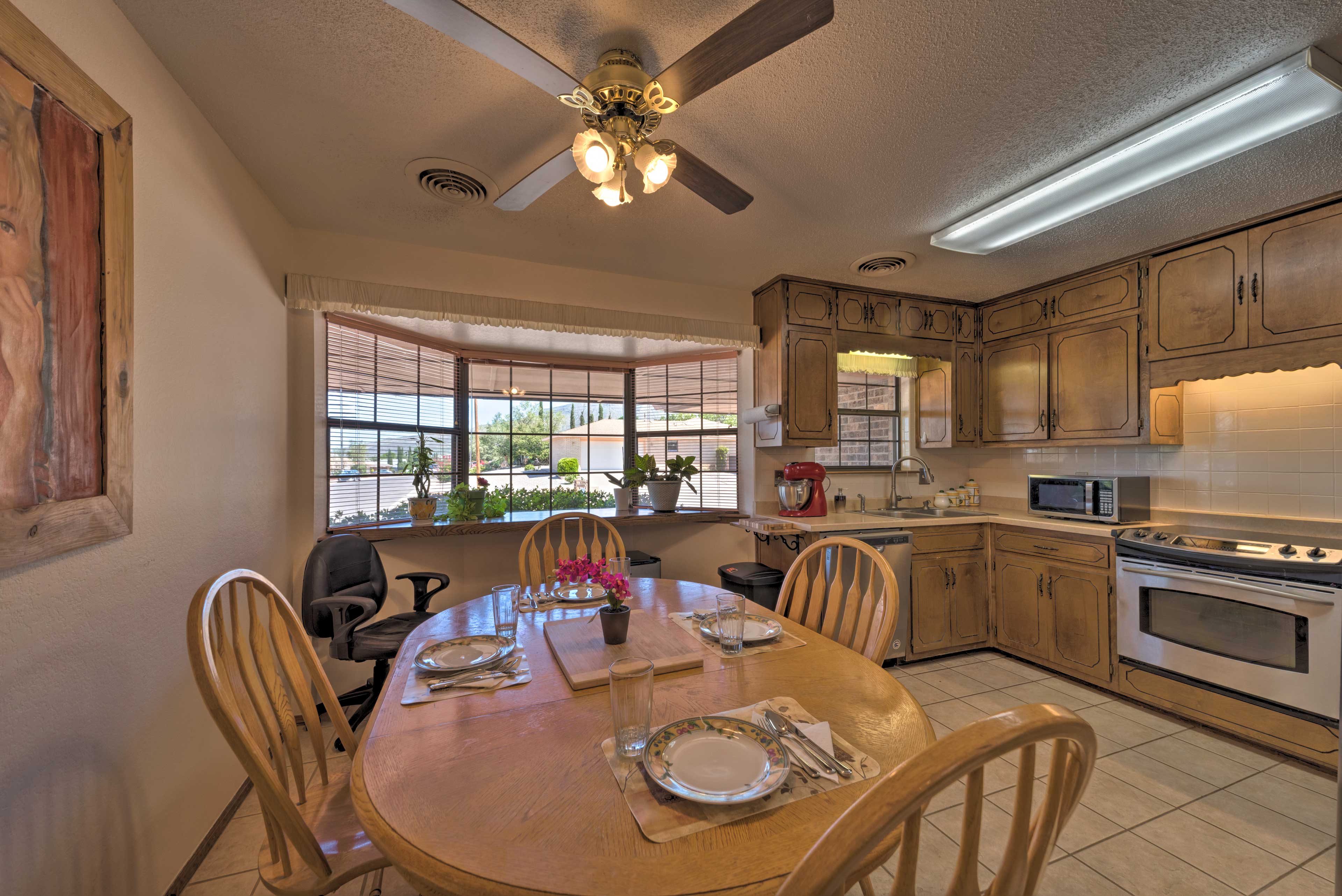 Seat 4 around the large oak dining table.