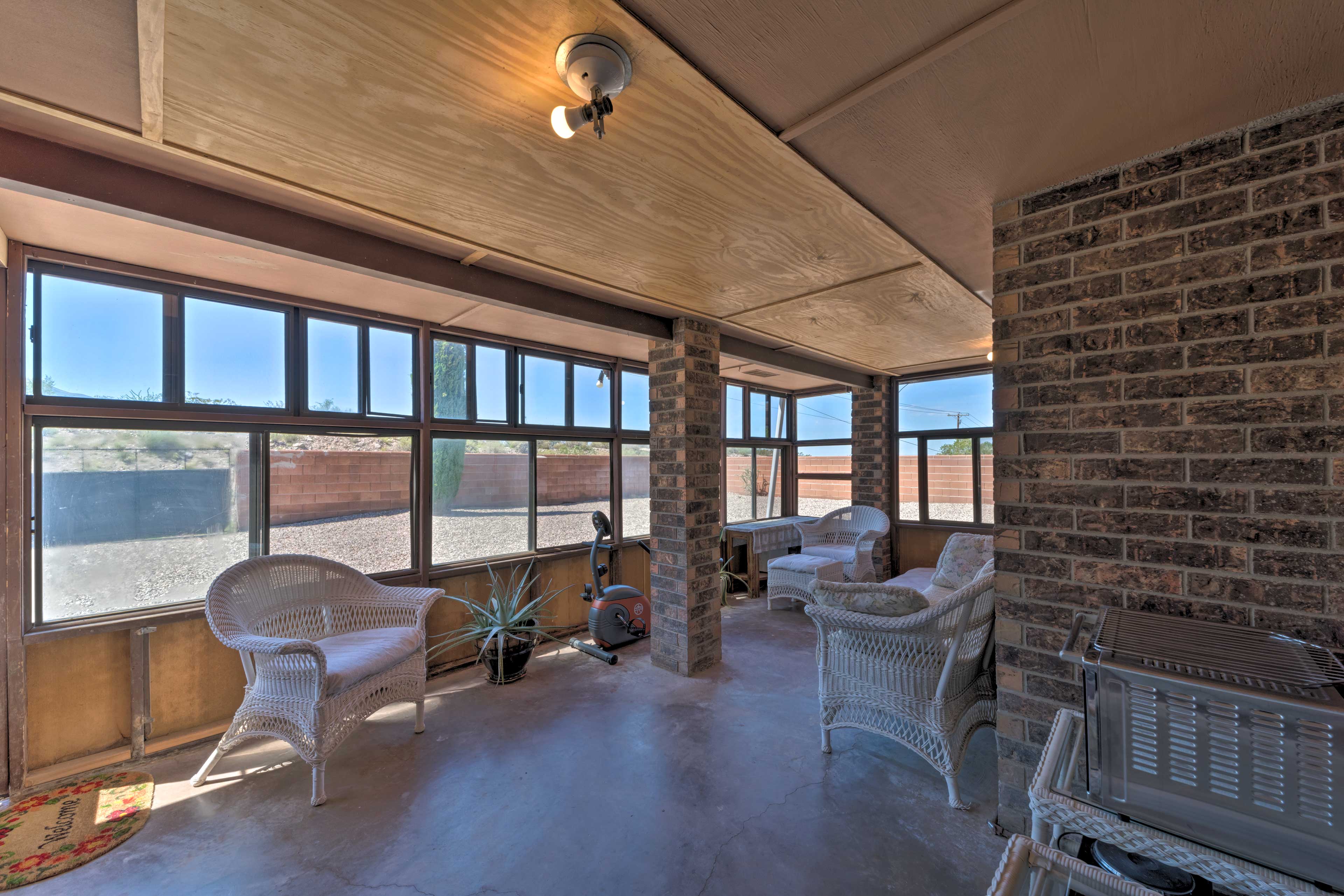 Bask in warm New Mexico rays in the sunroom.