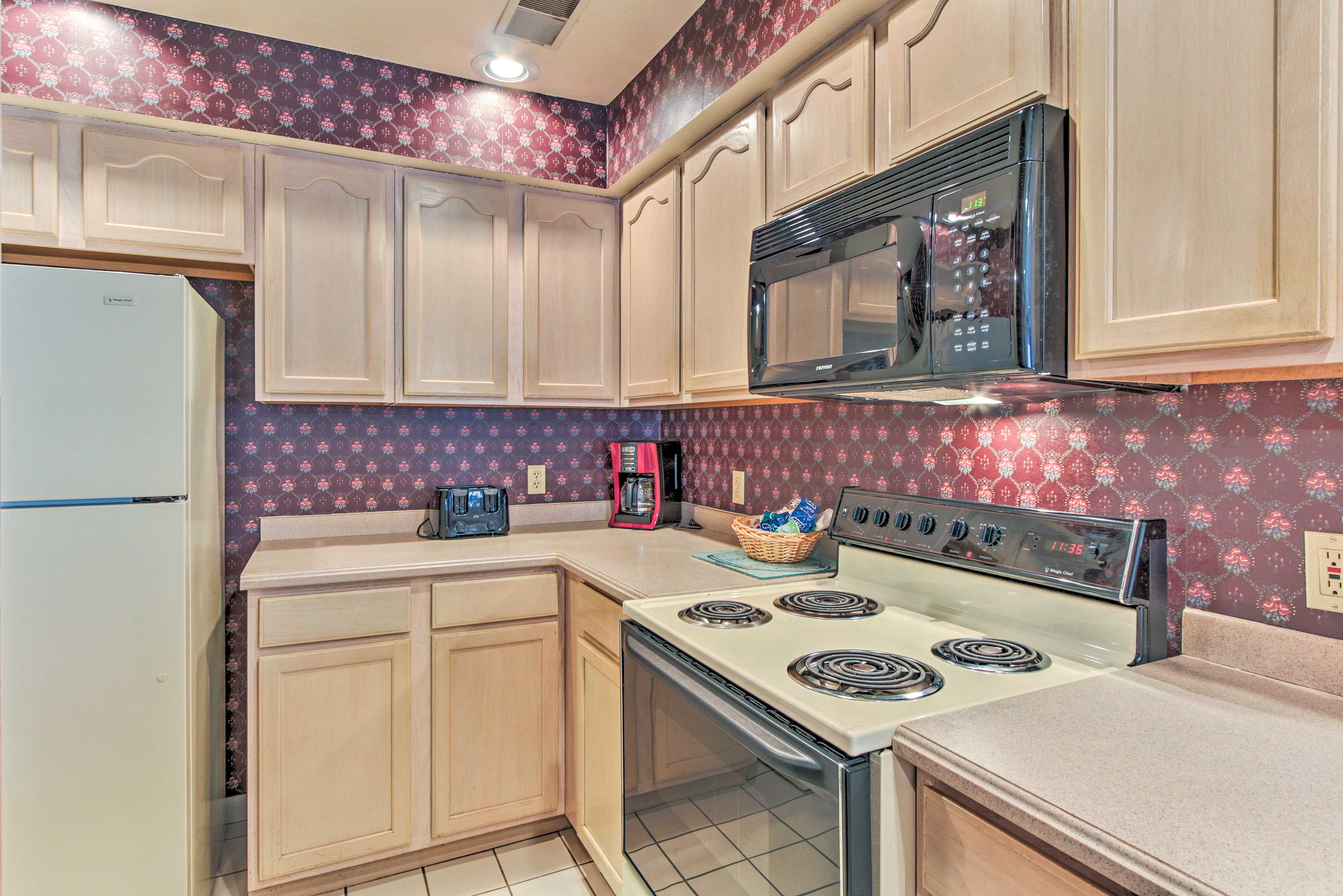 The kitchen is fully equipped with updated appliances.