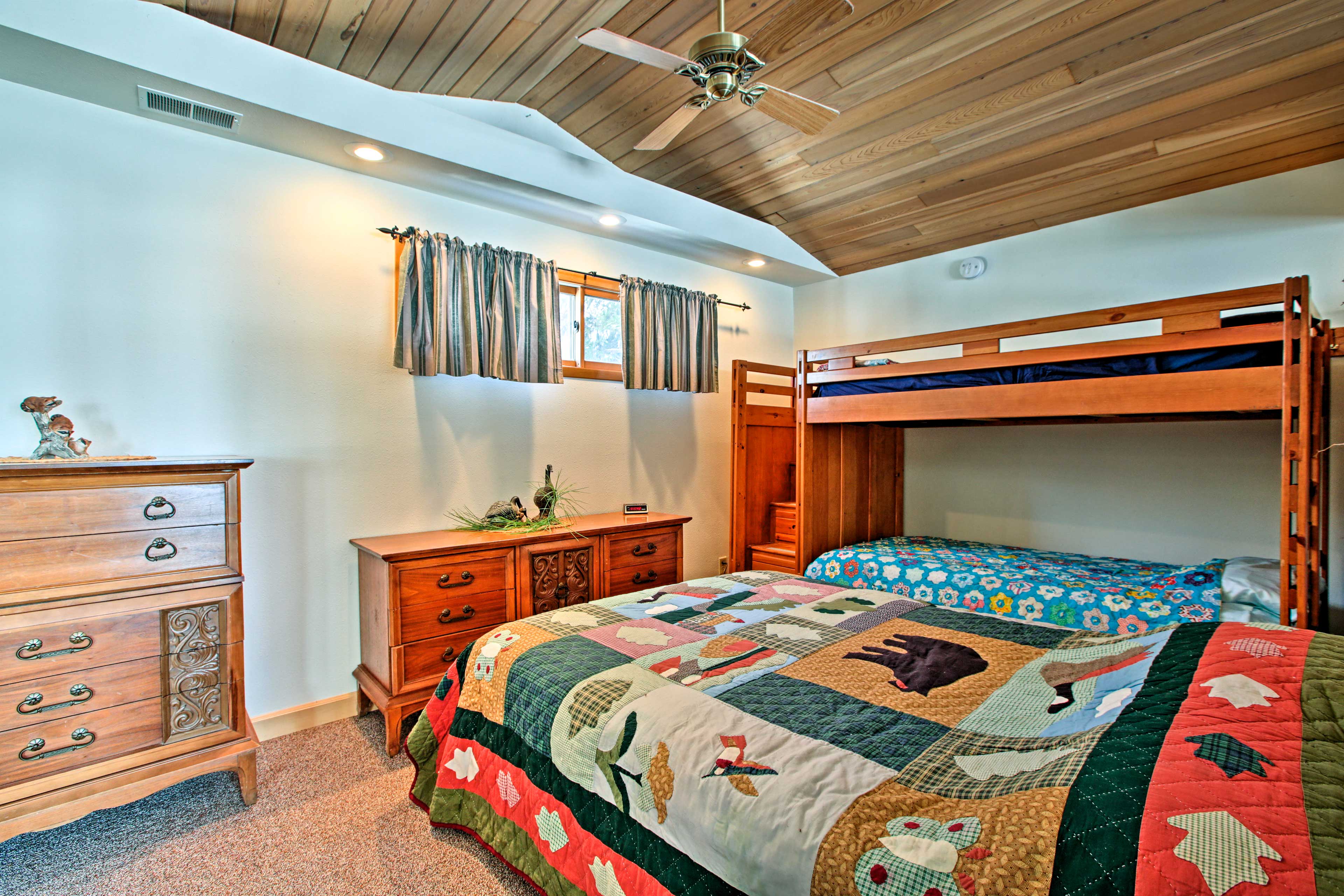 The property is filled with comfortable home furnishings and lake-themed decor.