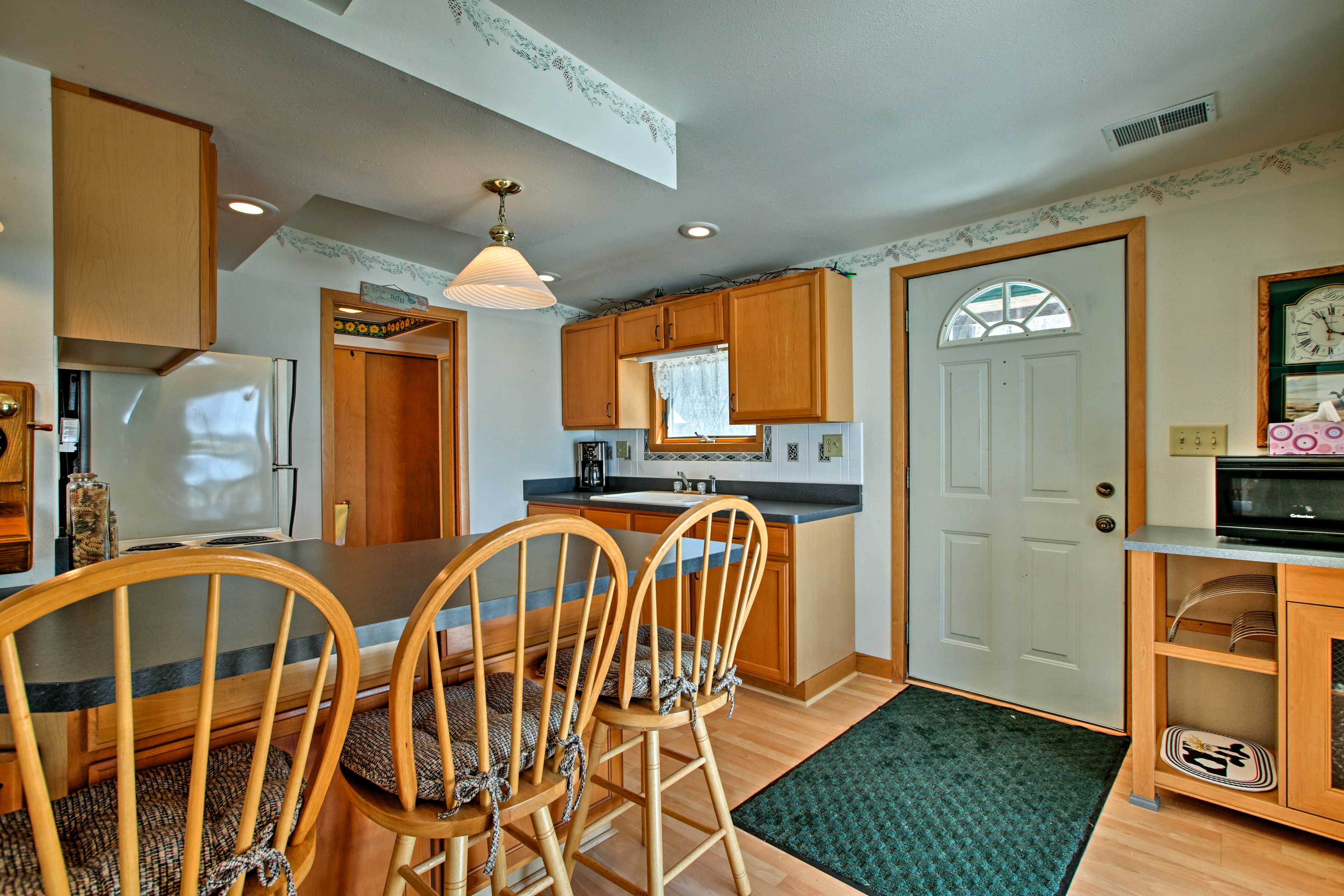 Sip your morning coffee at the 4-person breakfast bar.