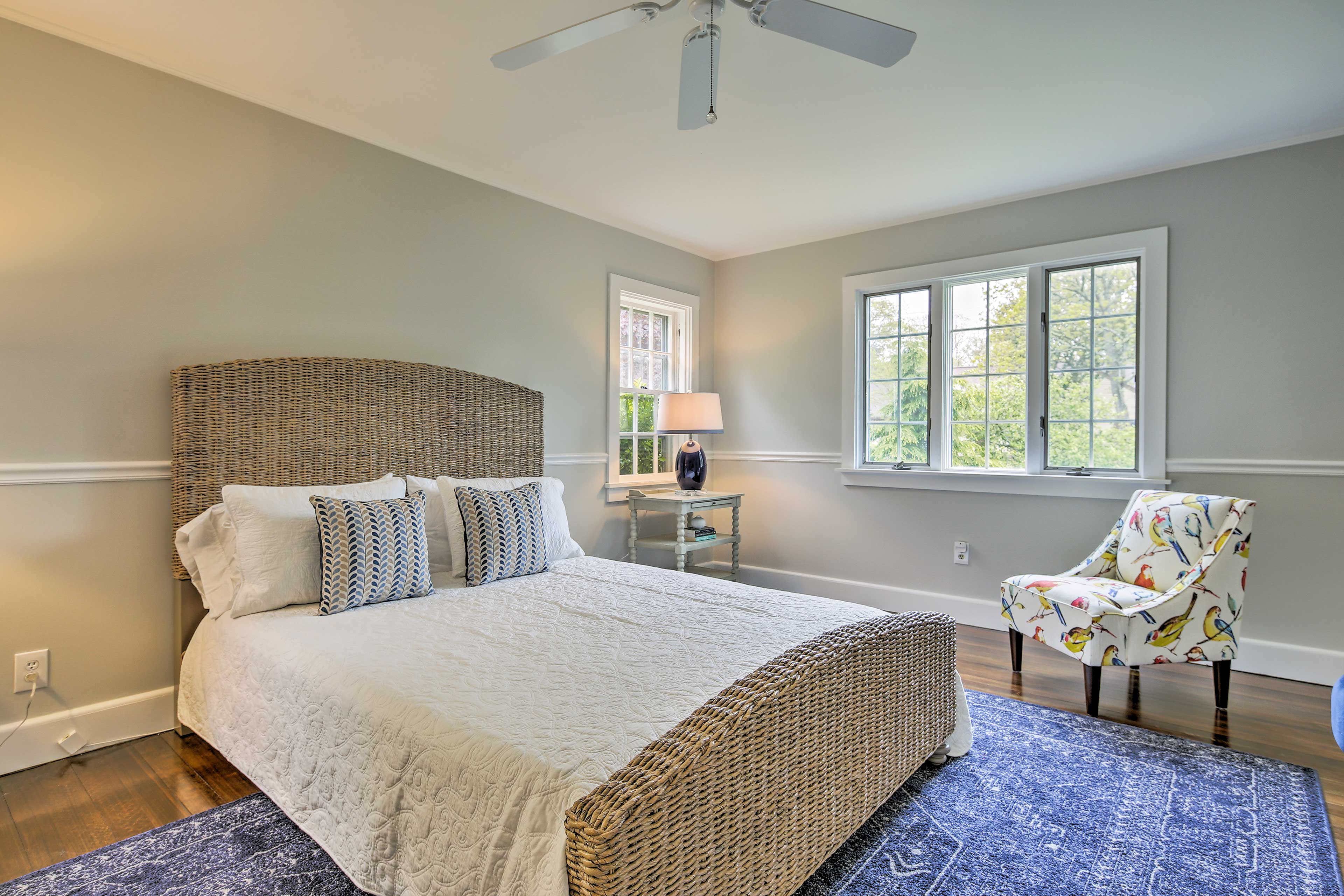 A queen platform bed is found in this bedroom.