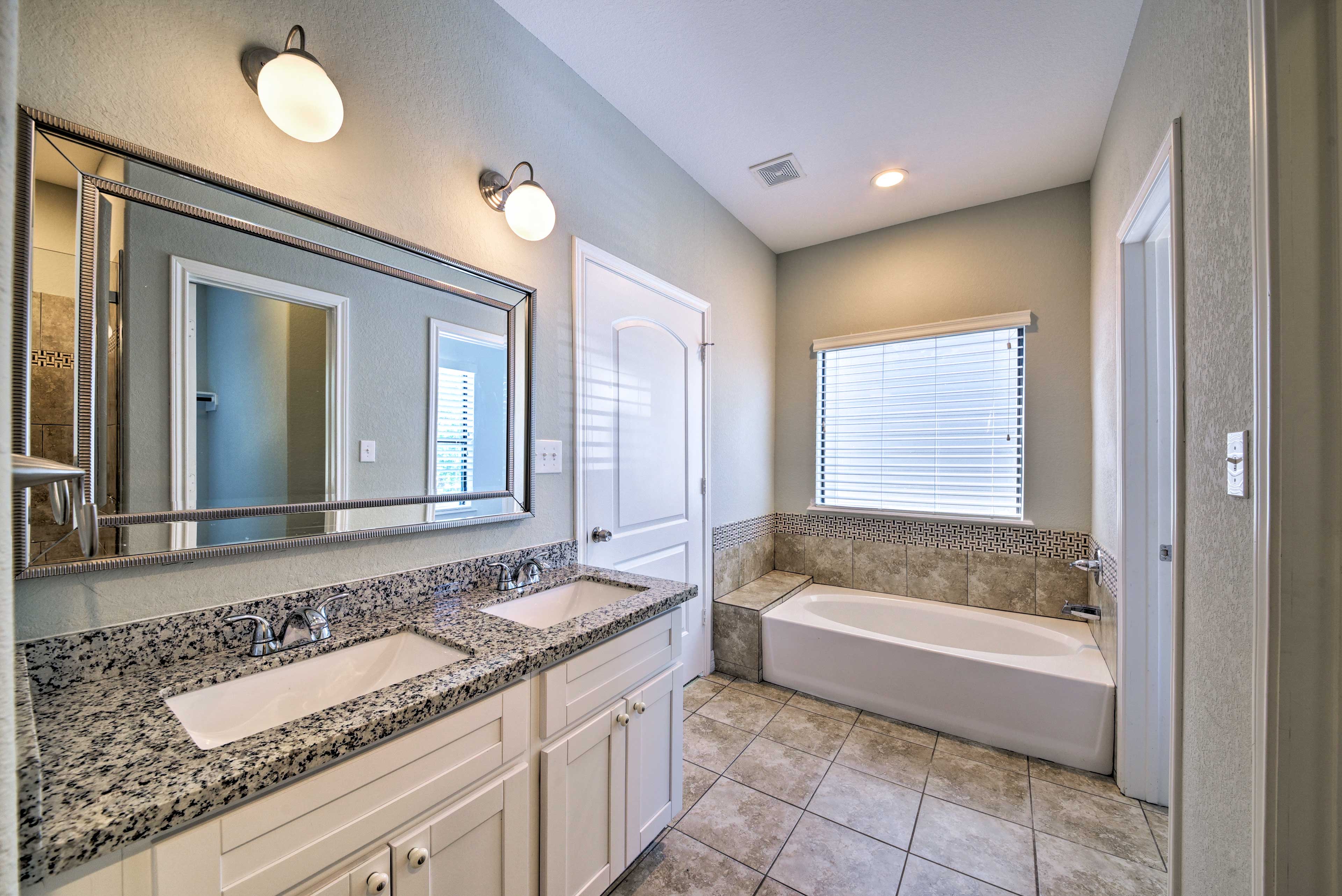 Soak your worries away in the built-in tub.