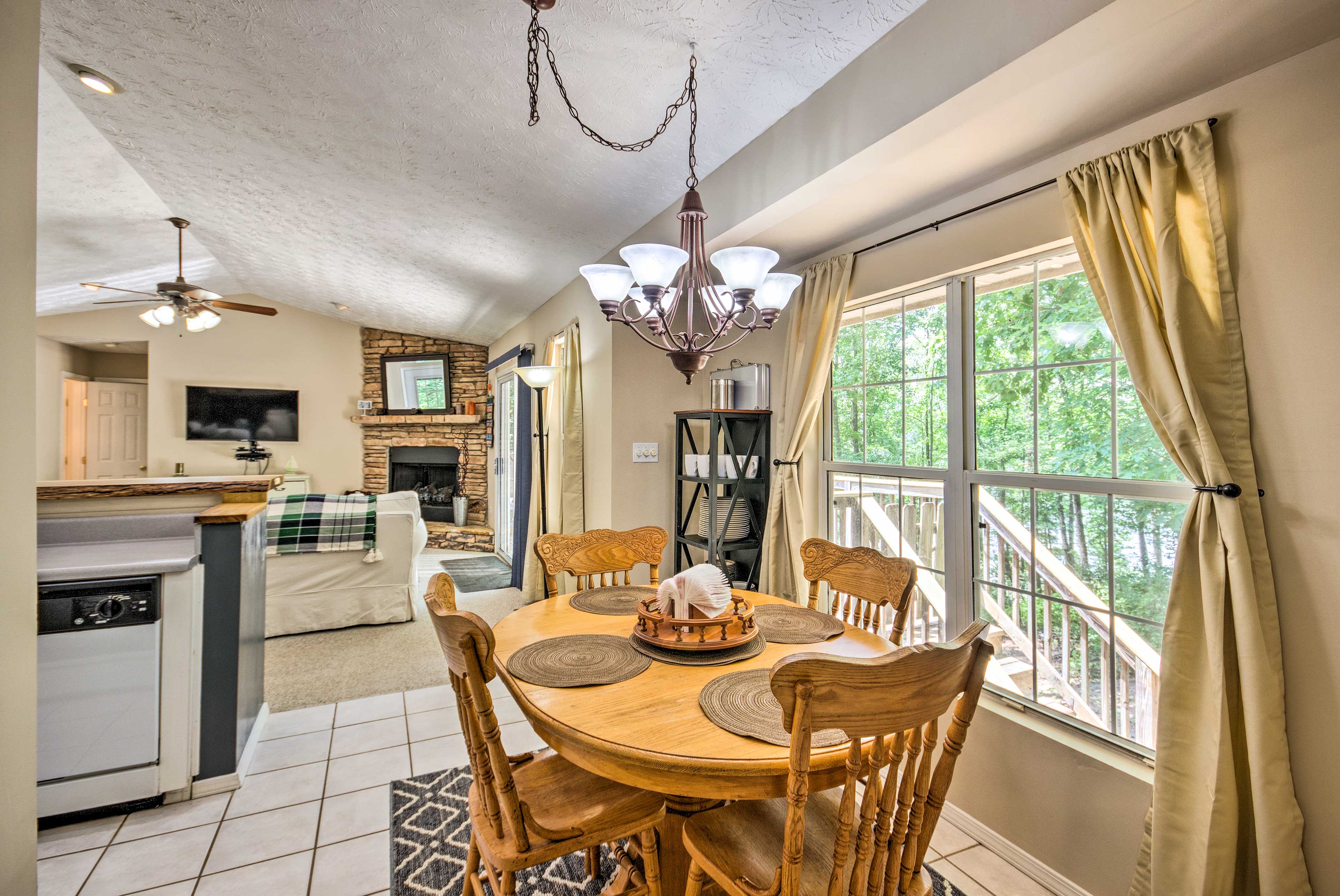 Dine with wooded views at the 4-person table.