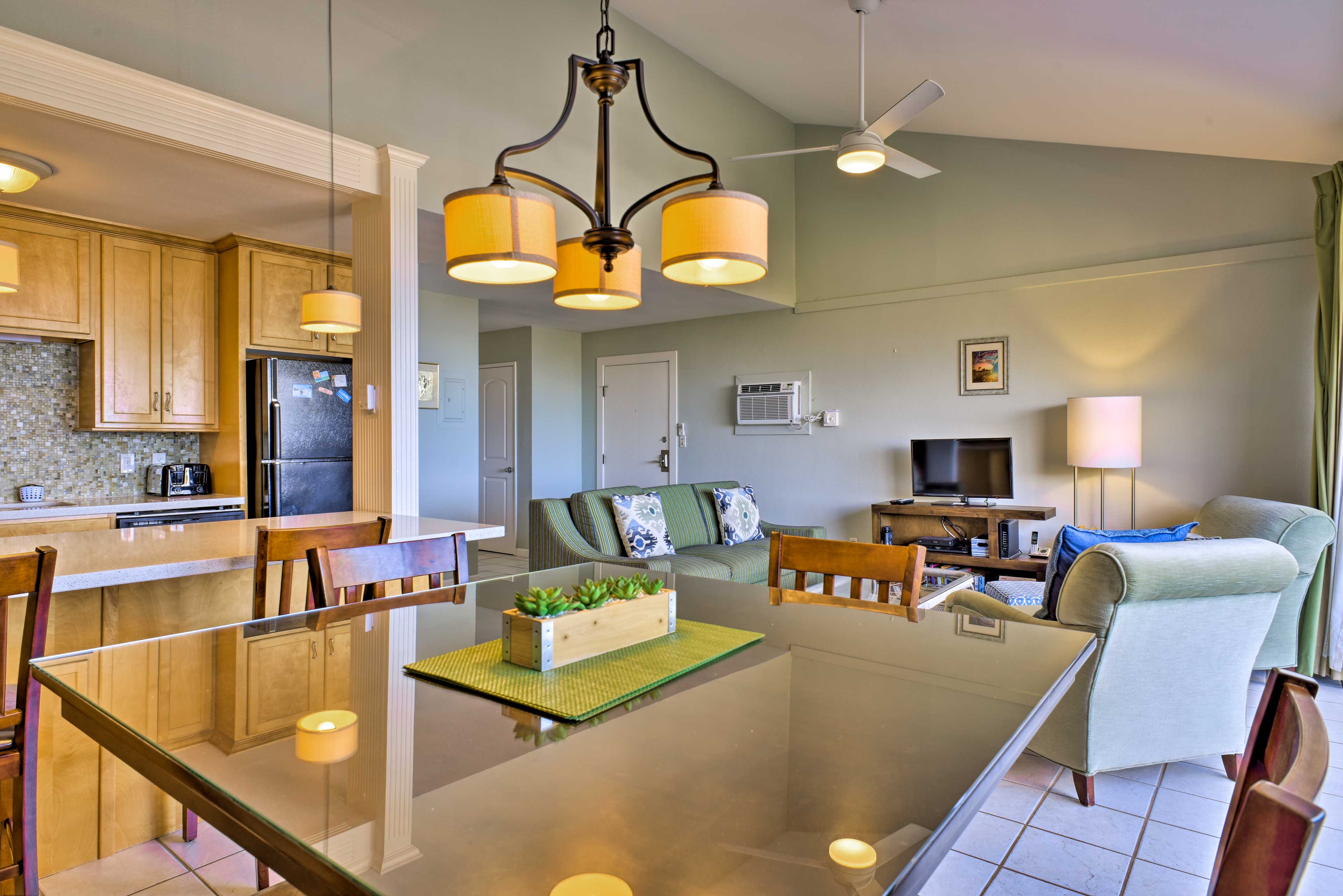 Vaulted ceilings create a light and airy feel in the condo.