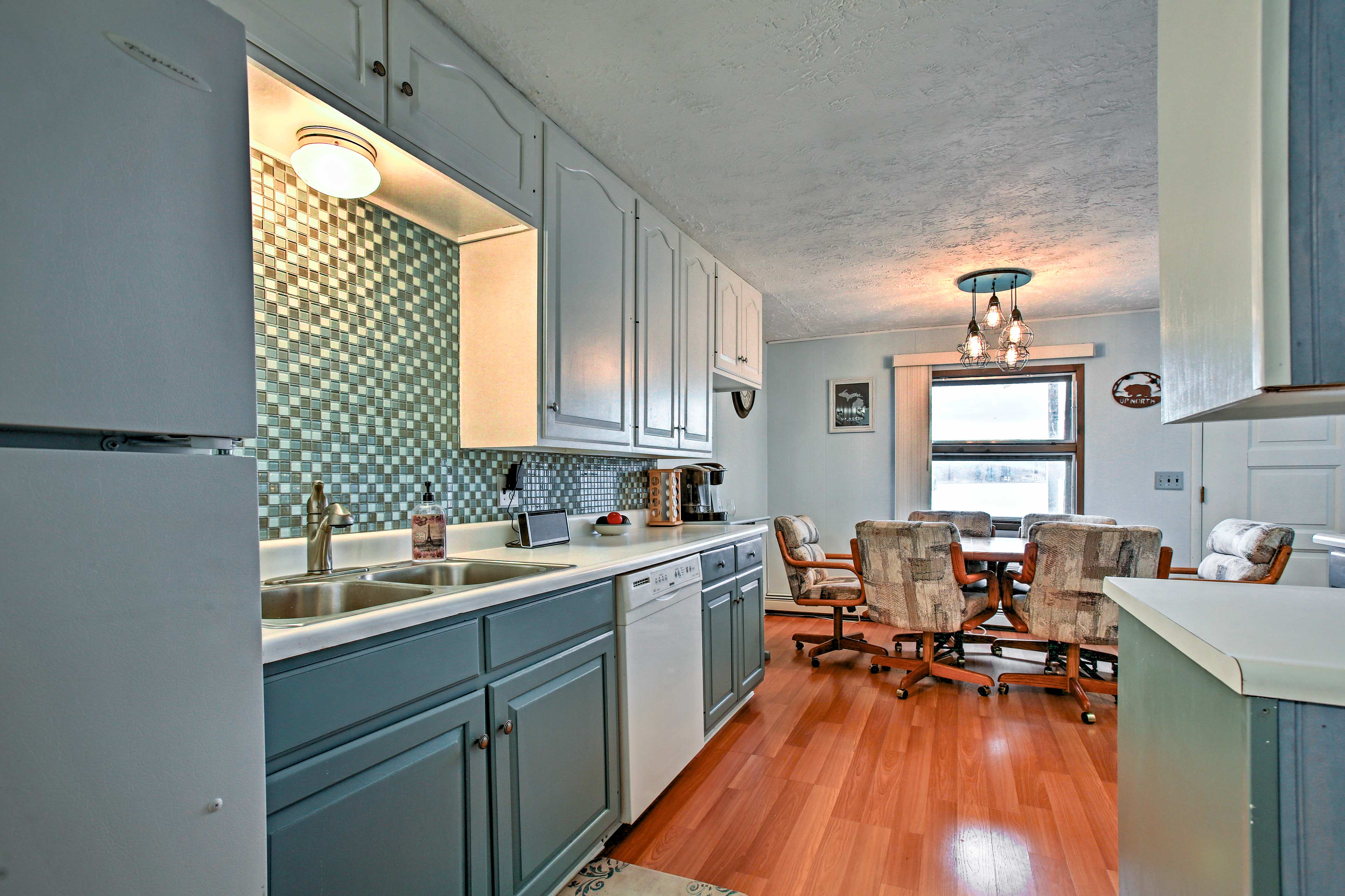 A bright blue kitchen invites your group's chef to get cooking!