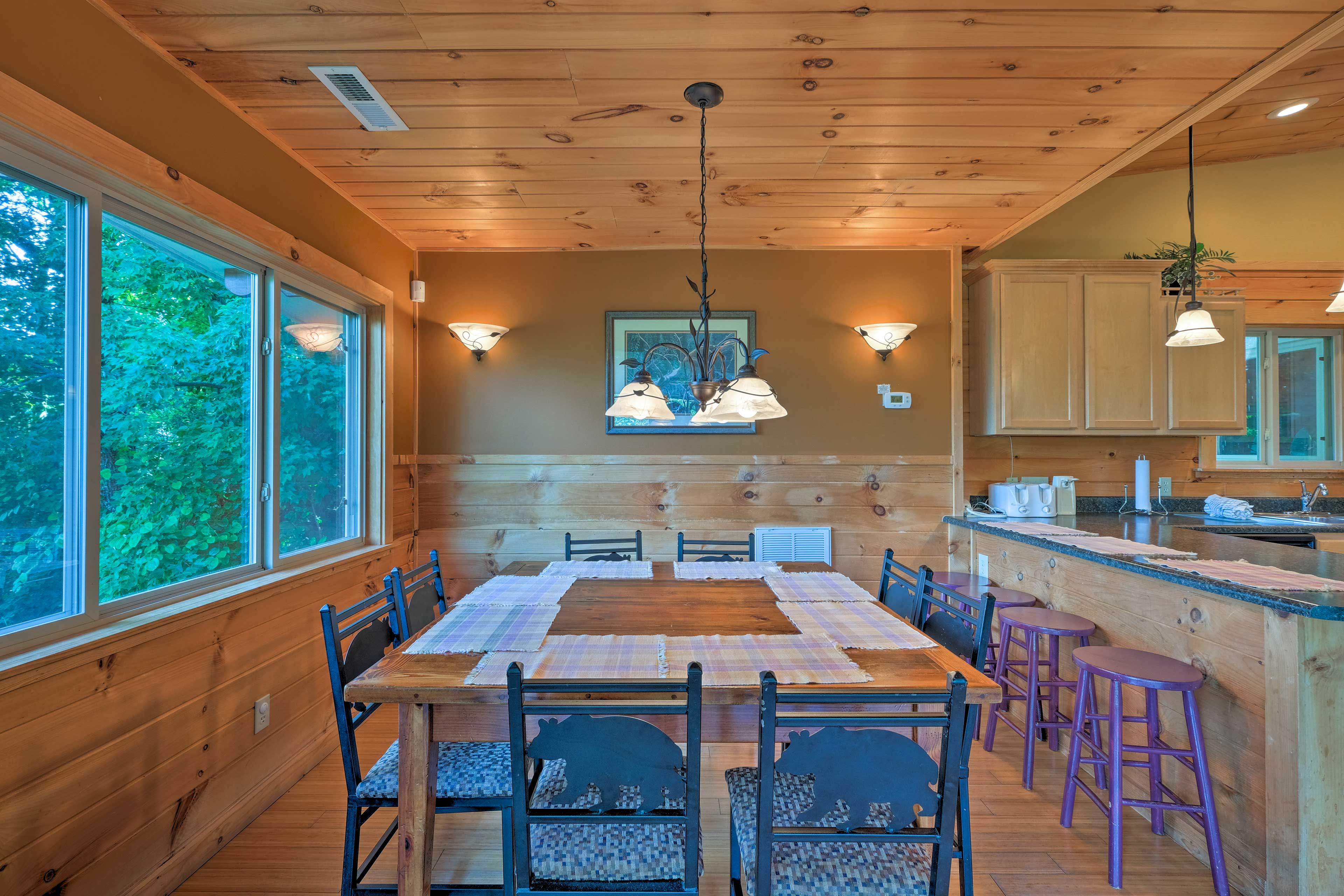 Dine at the 8-person table with additional seating at the breakfast bar.