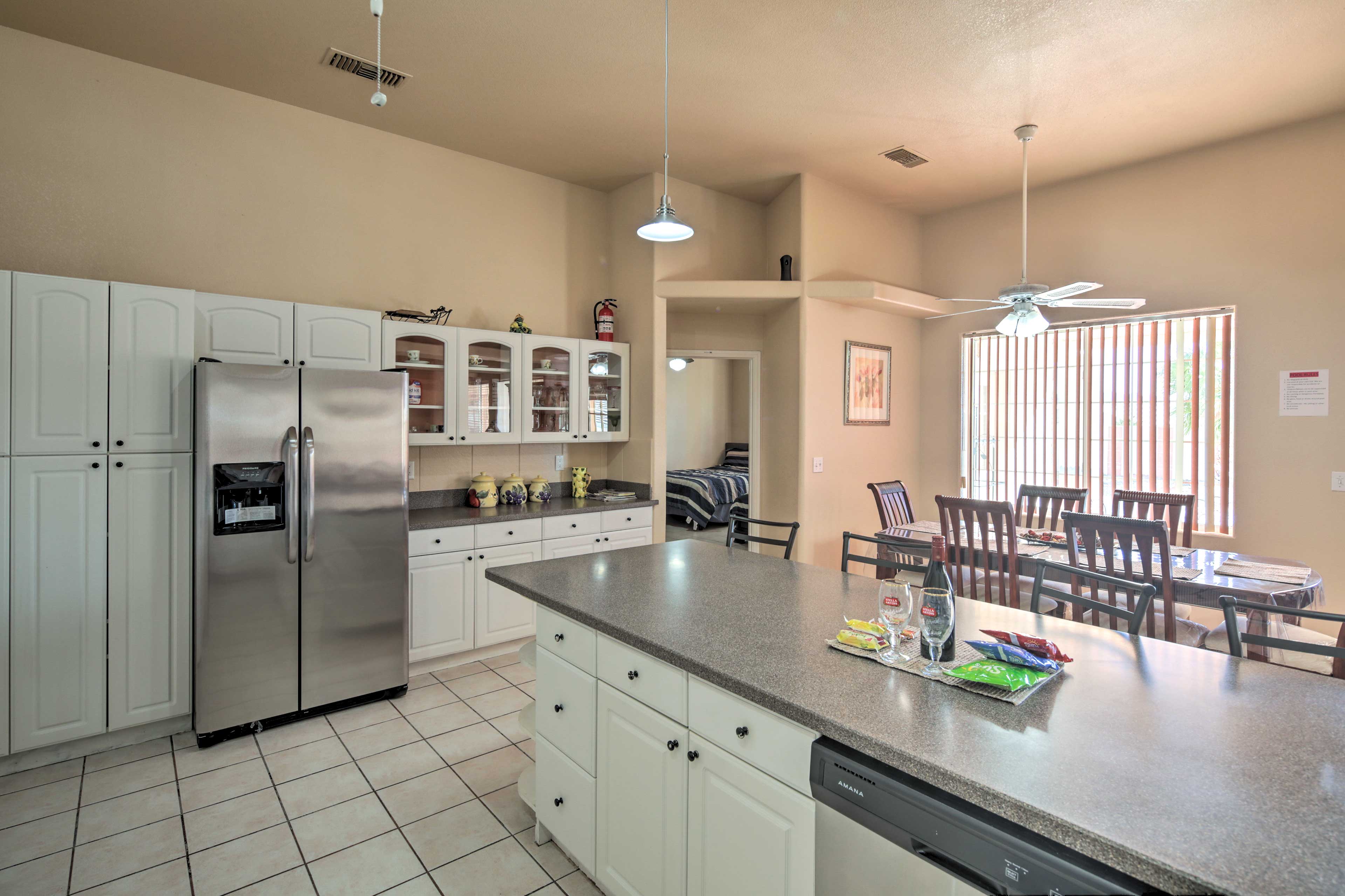 The kitchen offers stainless steel appliances and tons of counter space.